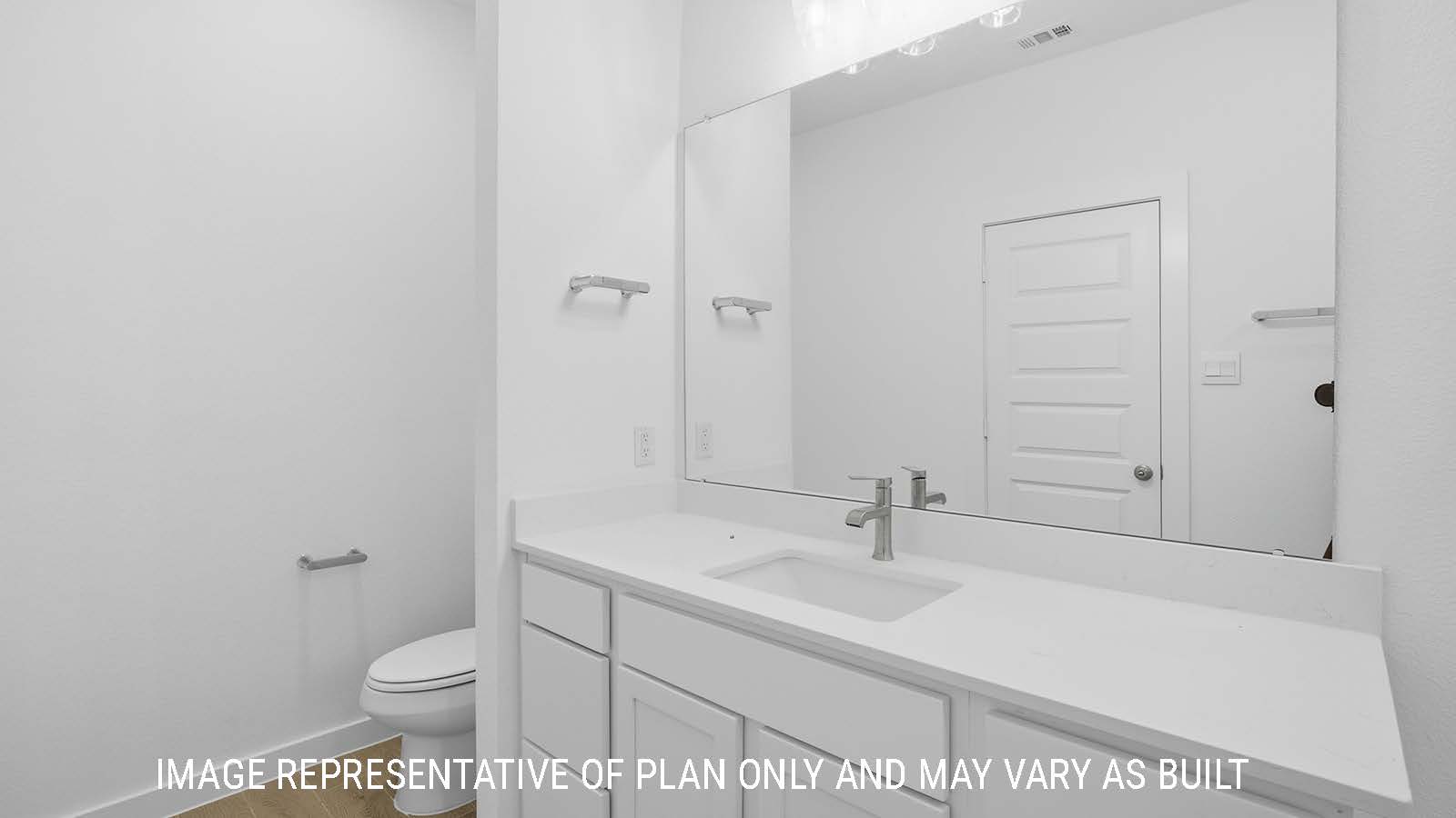 Berkshire secondary bathroom with vanity sink with white countertops and white cabinets.