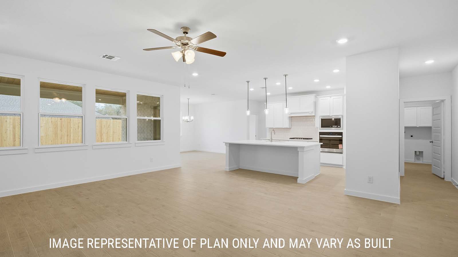 Berkshire living room with view of open concept kitchen and front entry hallway.