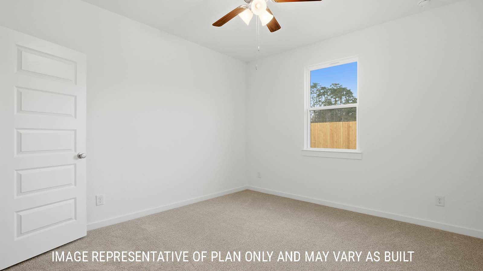 Berkshire secondary bedroom with carpeted flooring and window for natural lighting.