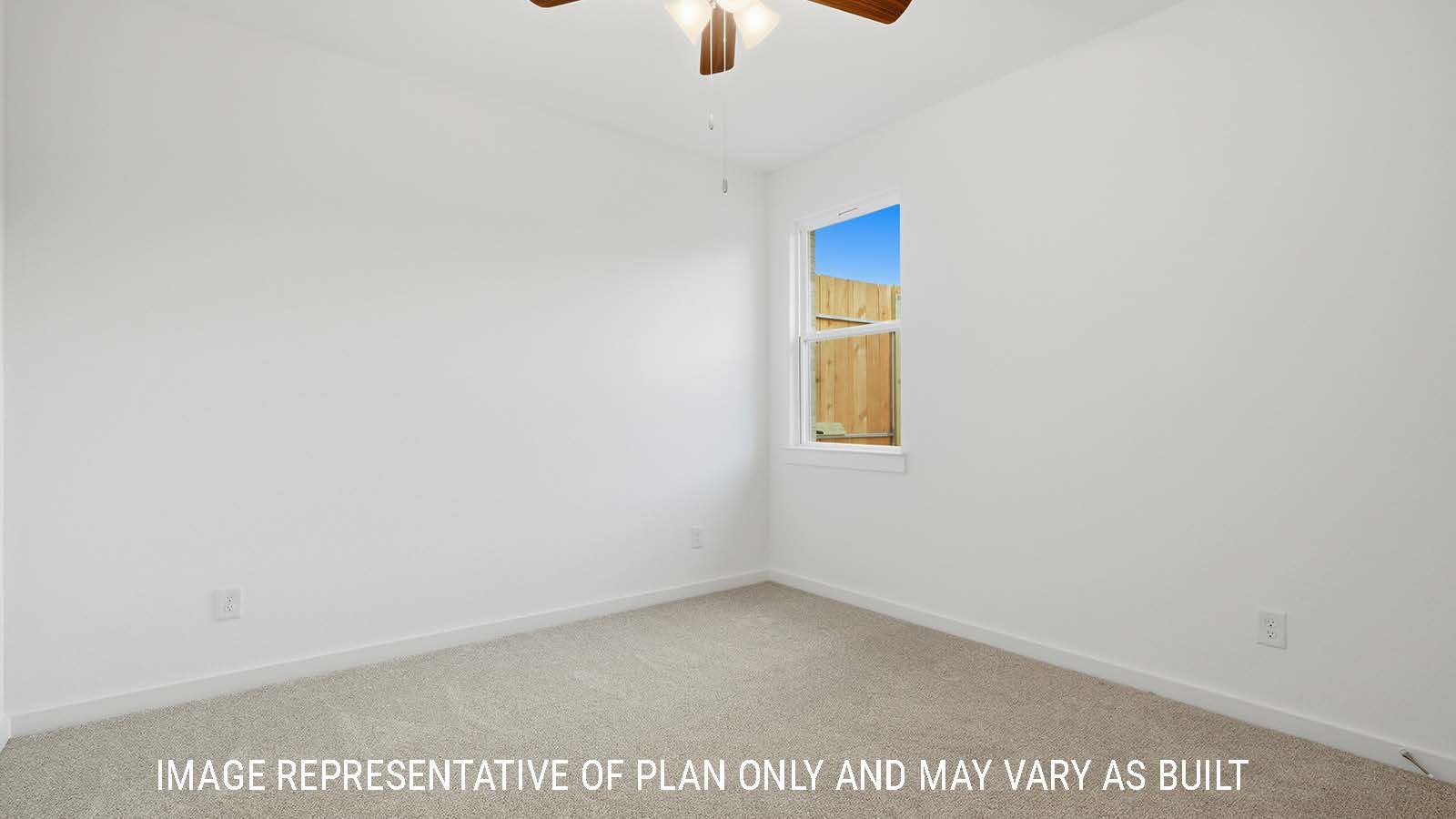 Berkshire secondary bedroom with carpeted flooring and window for natural lighting.