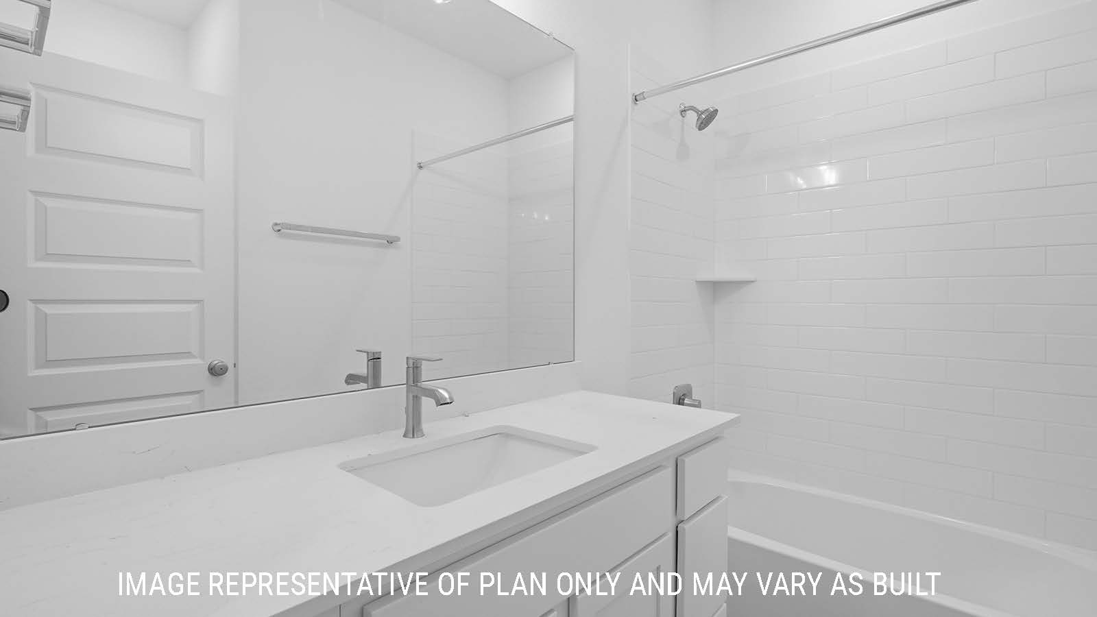 Berkshire secondary bathroom with vanity sink and shower and tub combo.