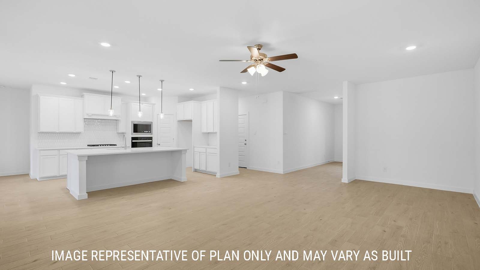 Berkshire living room with view of open concept kitchen and front entry hallway.