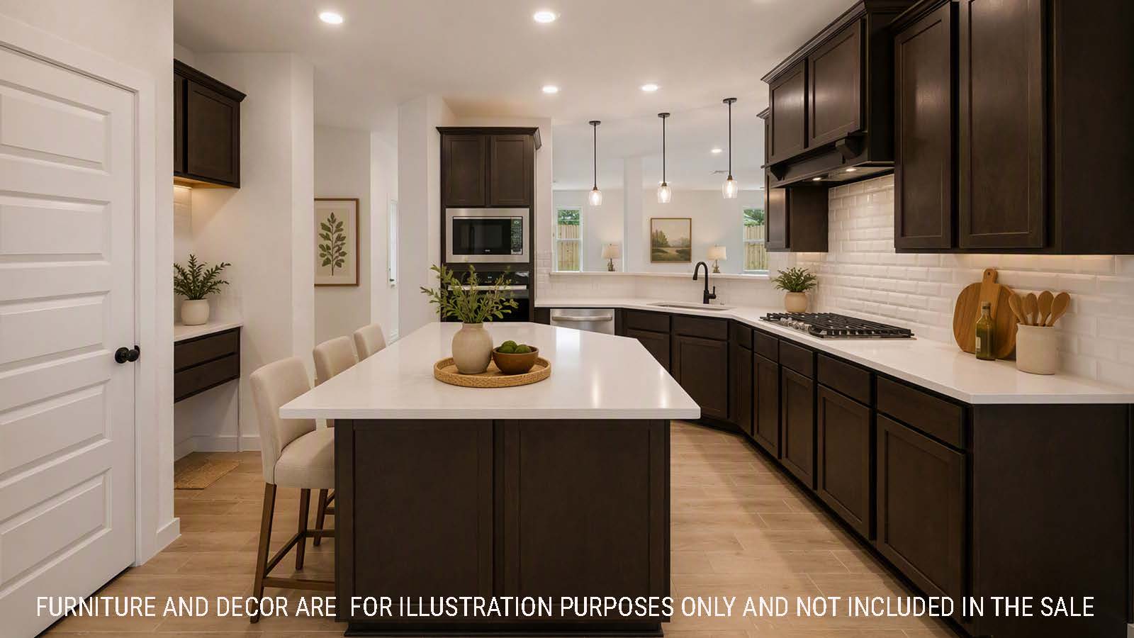 Newburgh kitchen with dark cabinets and white countertops and view of living room.