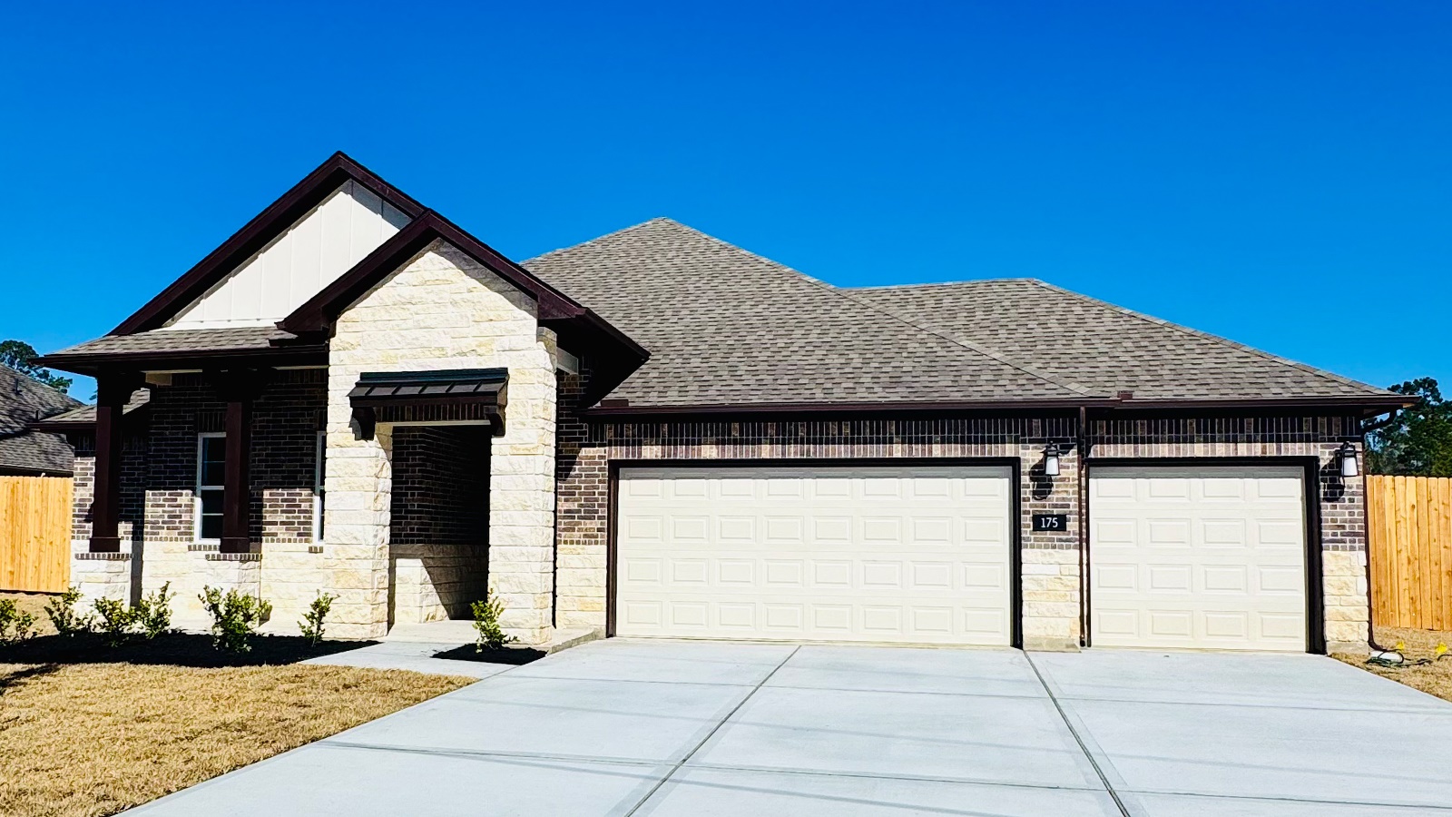 Newburgh Front Exterior Y Elevation with 3 Car Garage.