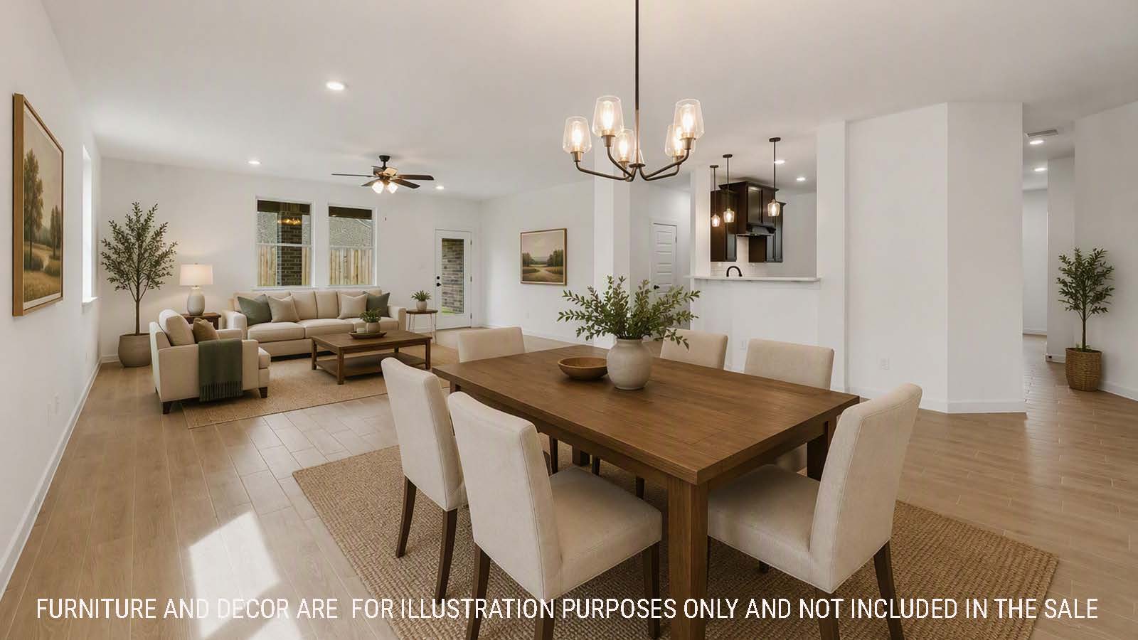 Newburgh dining room with view of kitchen and living room with windows for natural lighting.