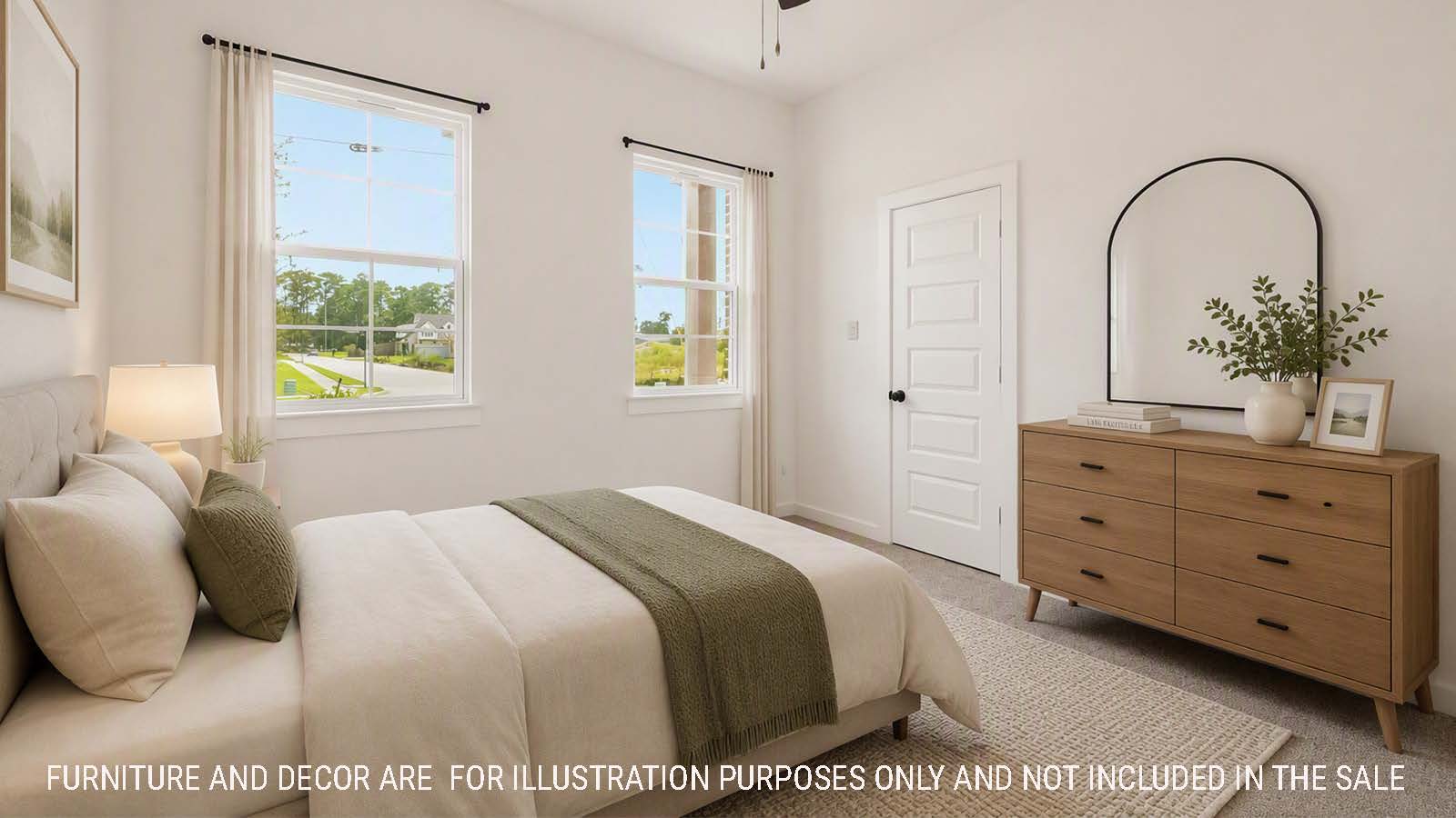 Newburgh secondary bedroom with carpeted flooring and windows for natural lighting.
