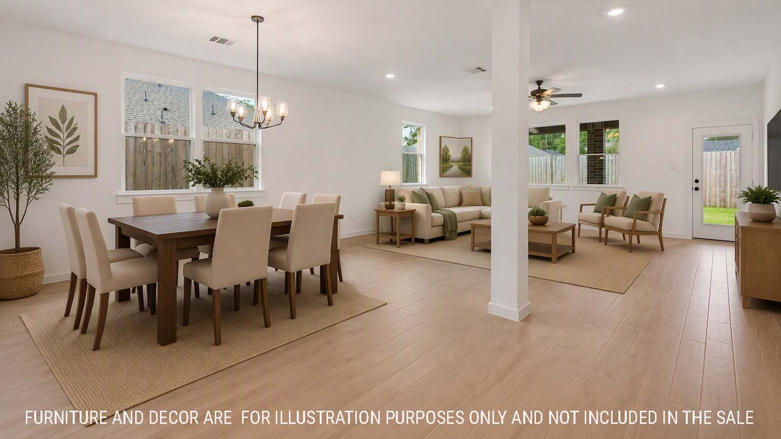 Newburgh dining room with view of kitchen and living room with windows for natural lighting.