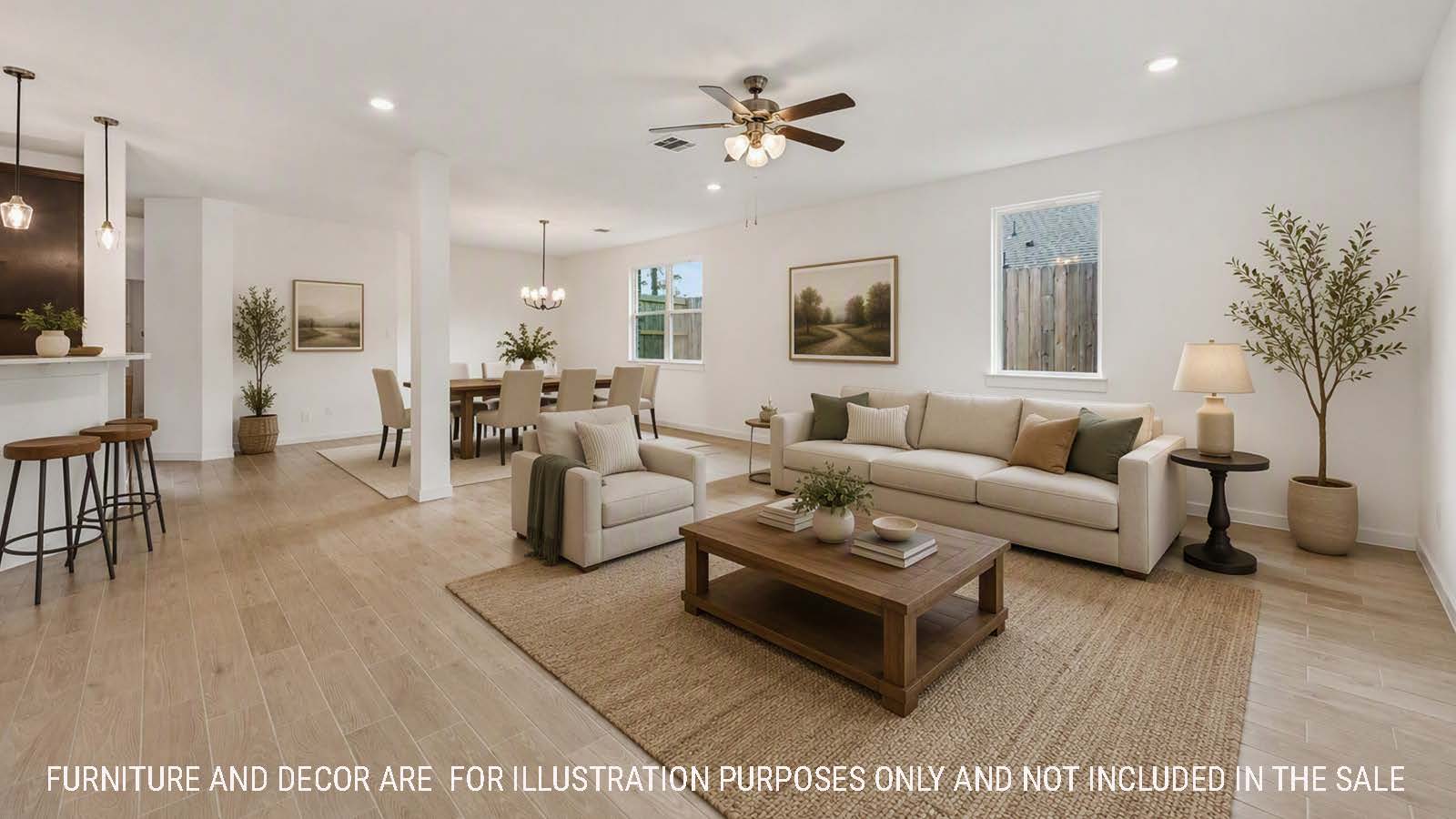 Newburgh living room with vanity plank flooring and view of dining room and kitchen.