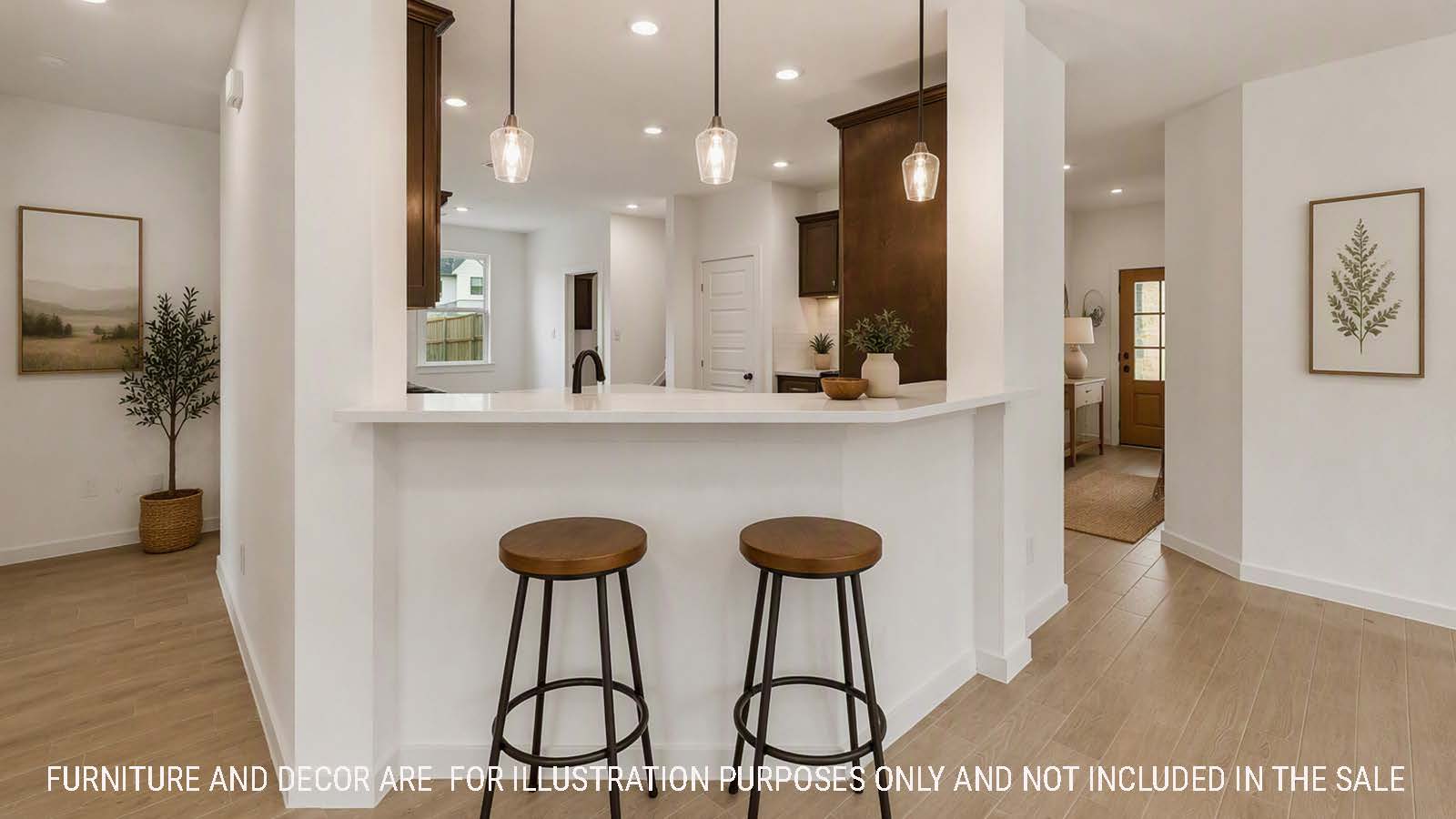 Newburgh kitchen with dark cabinets and white countertops and view of dining room.