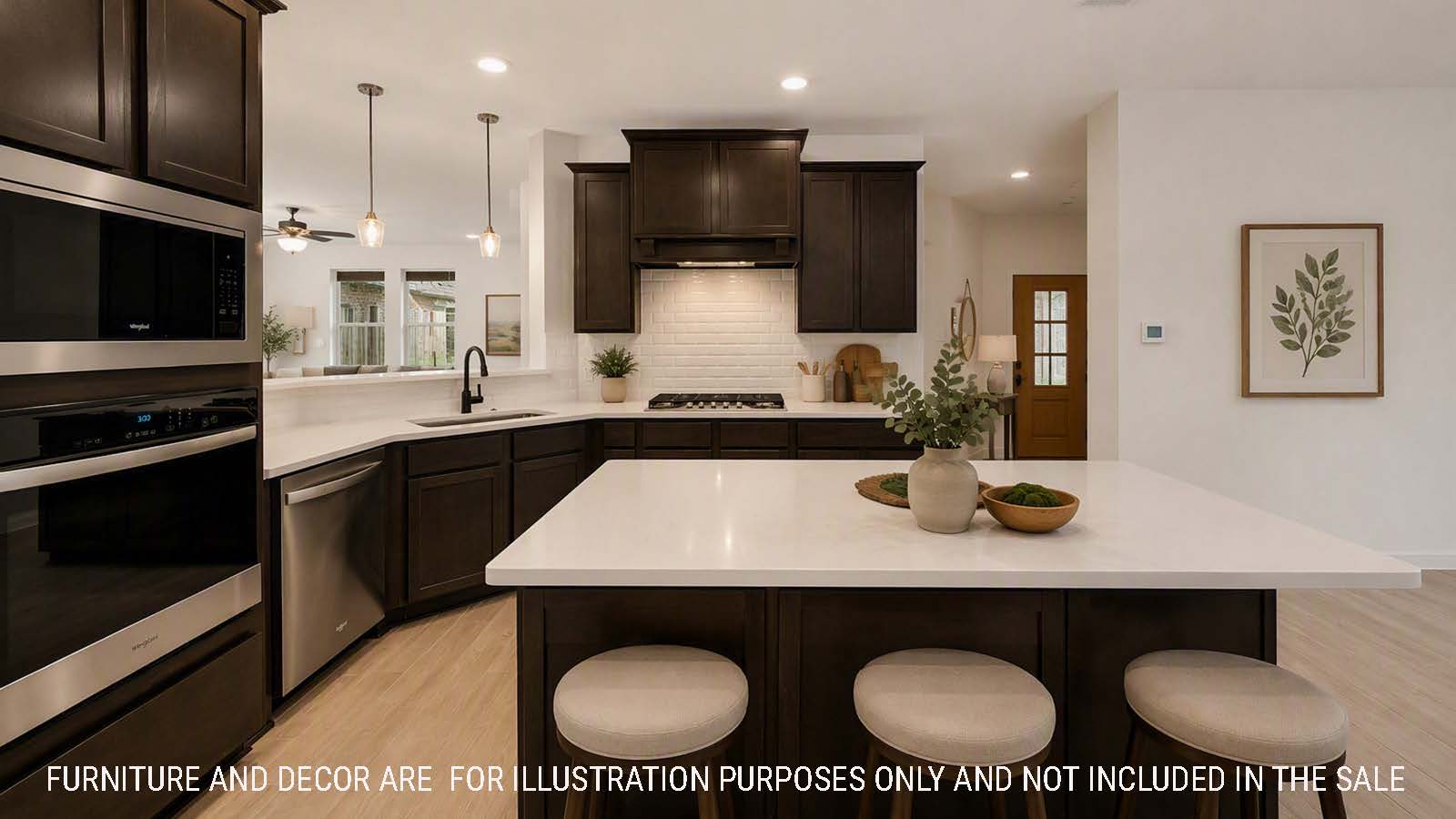 Newburgh kitchen with dark cabinets and white countertops and view of living room.