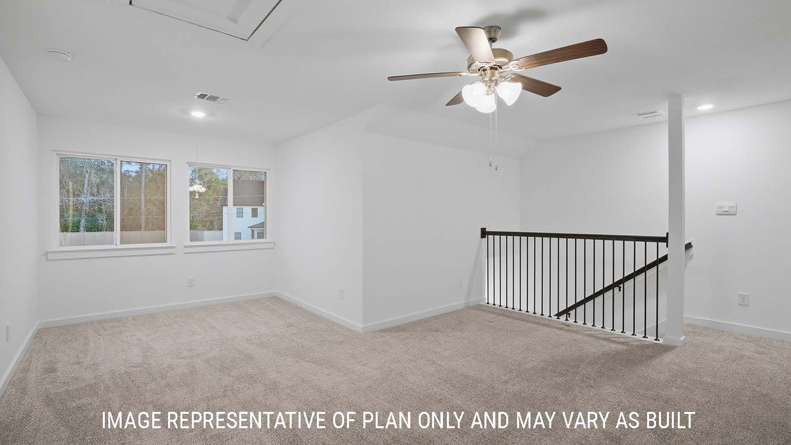 Newburgh game room with carpeted flooring and windows for natural lighting.