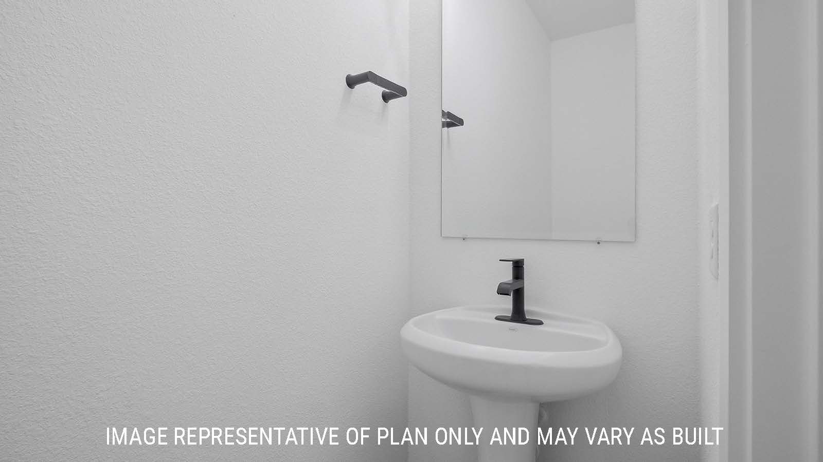 Newburgh secondary half bathroom with sink and mirror.