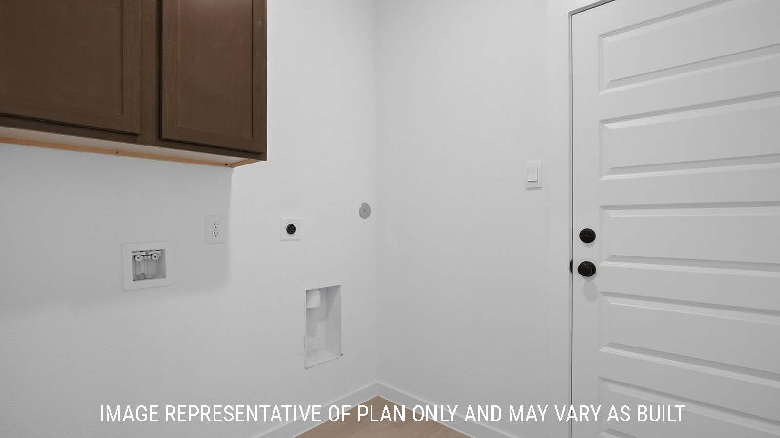 Newburgh utility room with washer and dryer connections and dark cabinets for storage.