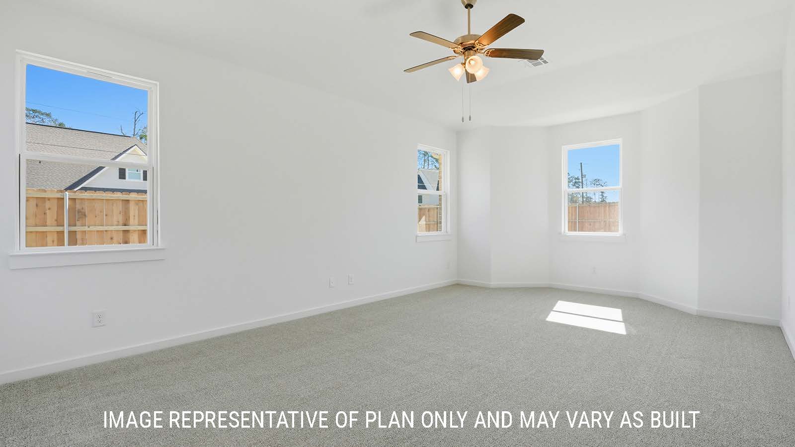 Waverley primary bedroom with carpeted flooring and windows for natural lighting.