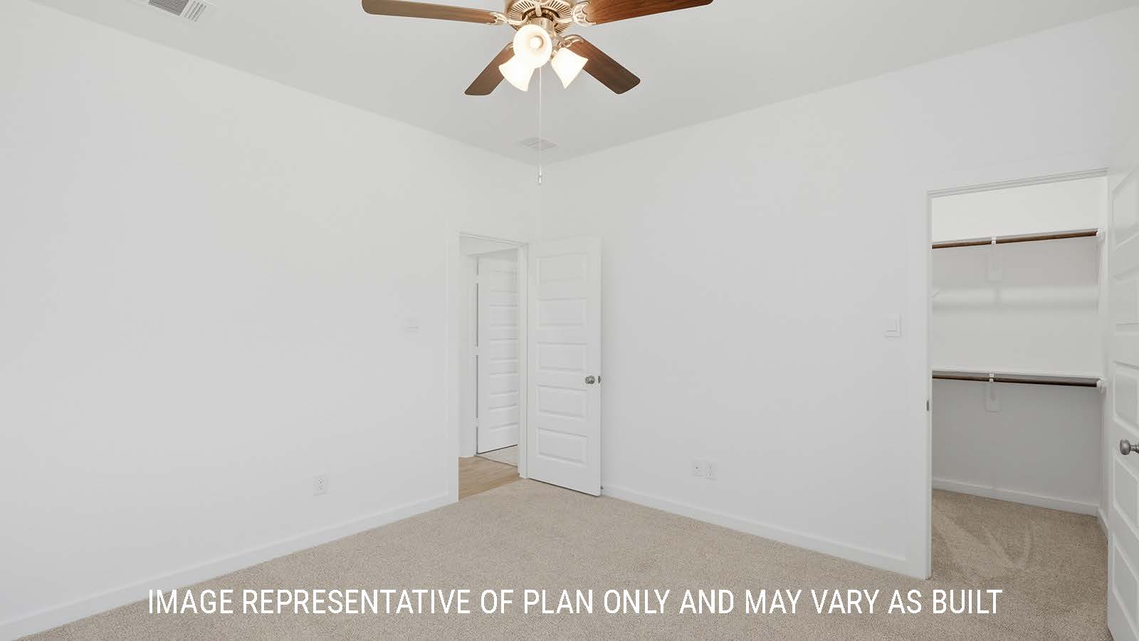 Waverley secondary bedroom with carpeted flooring and closet with view of hallway.