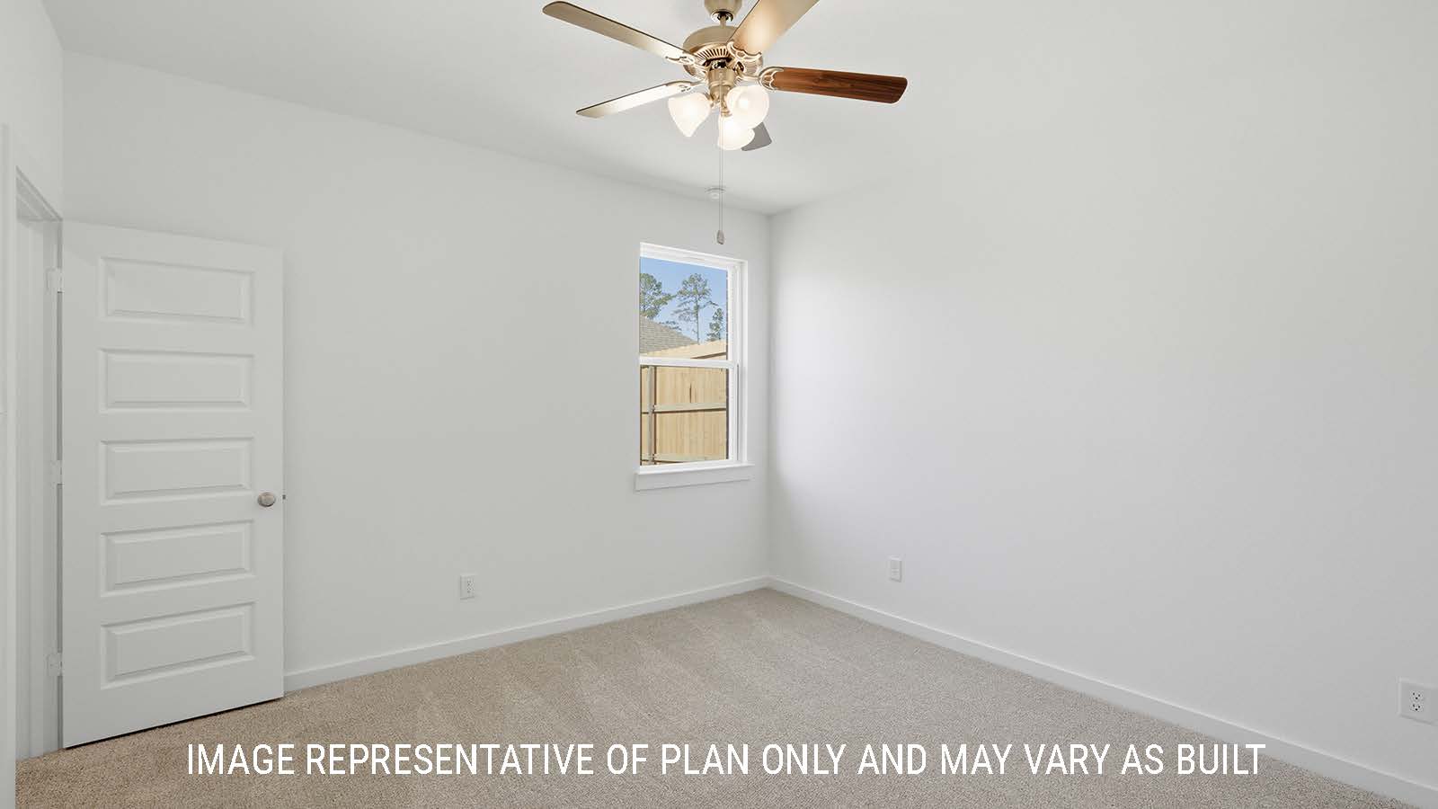 Waverley secondary bedroom with carpeted flooring and window for natural lighting.