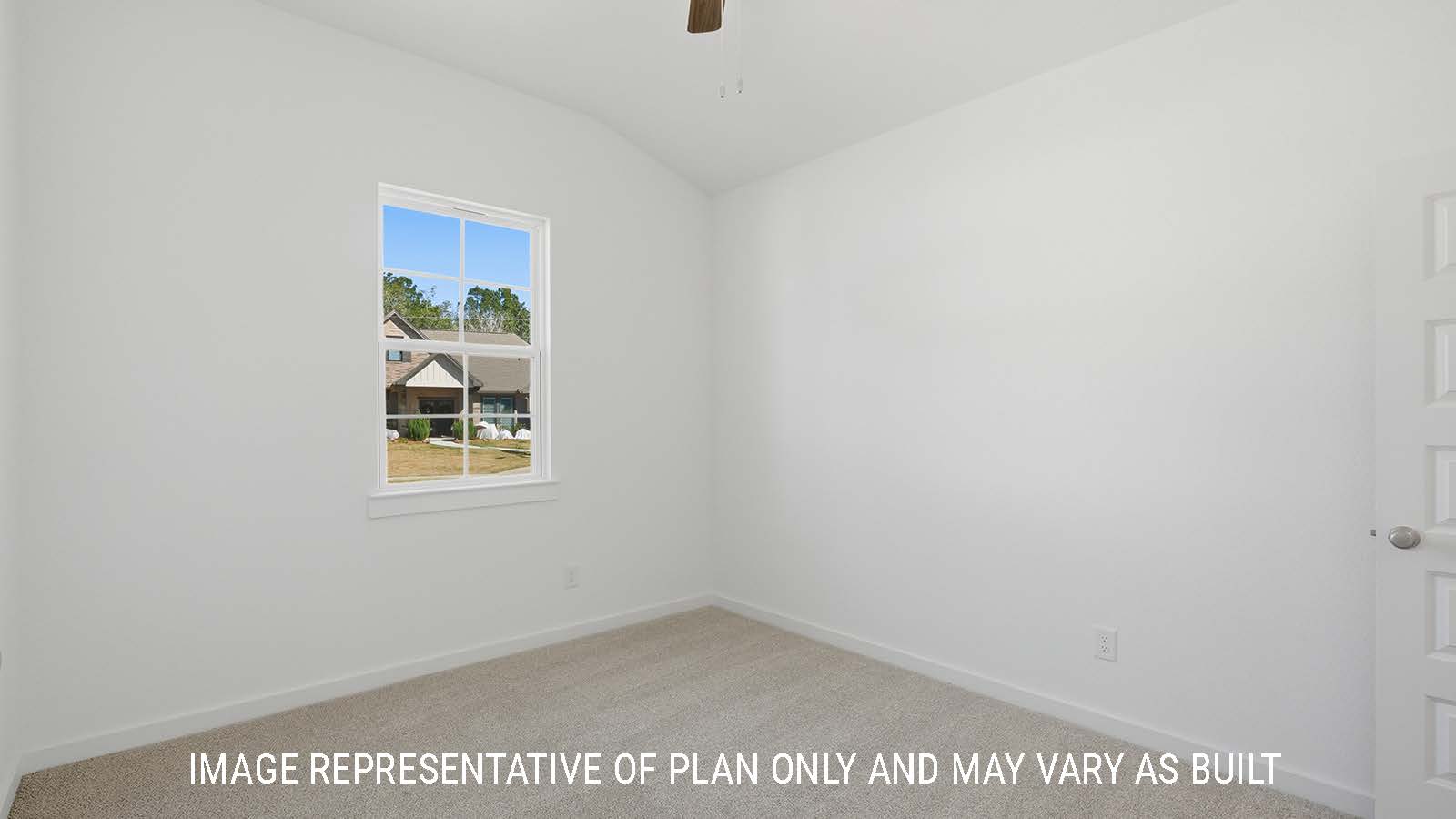 Waverley secondary bedroom with carpeted flooring and window for natural lighting.