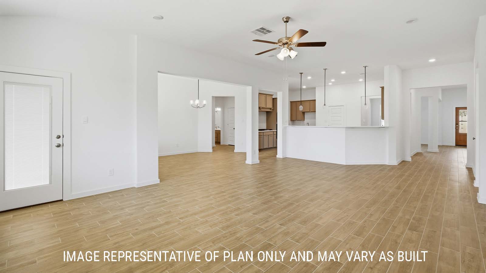 Waverley living room with view of front entry way and kitchen.