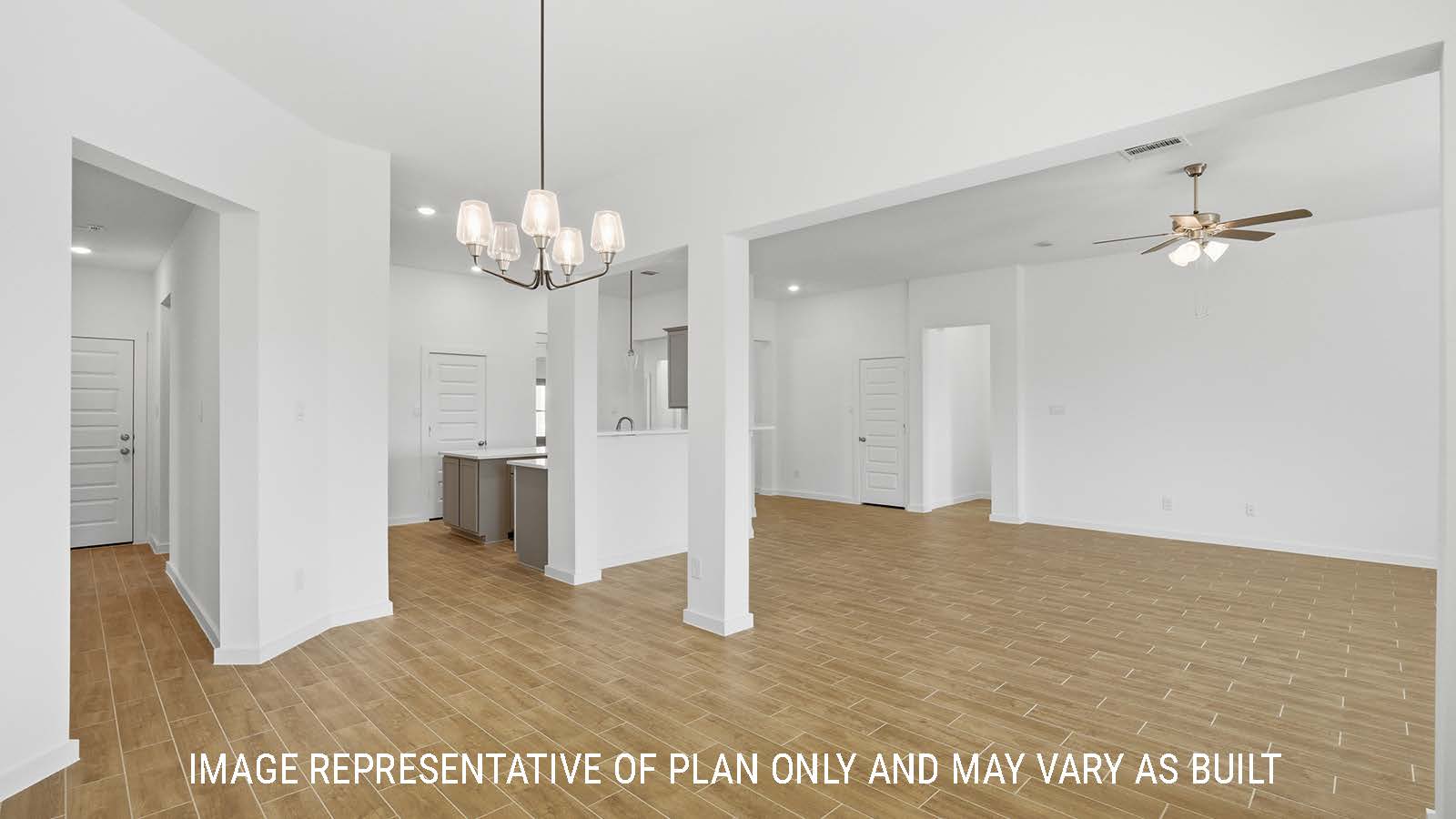 Waverley living room with view of kitchen and front entry way.