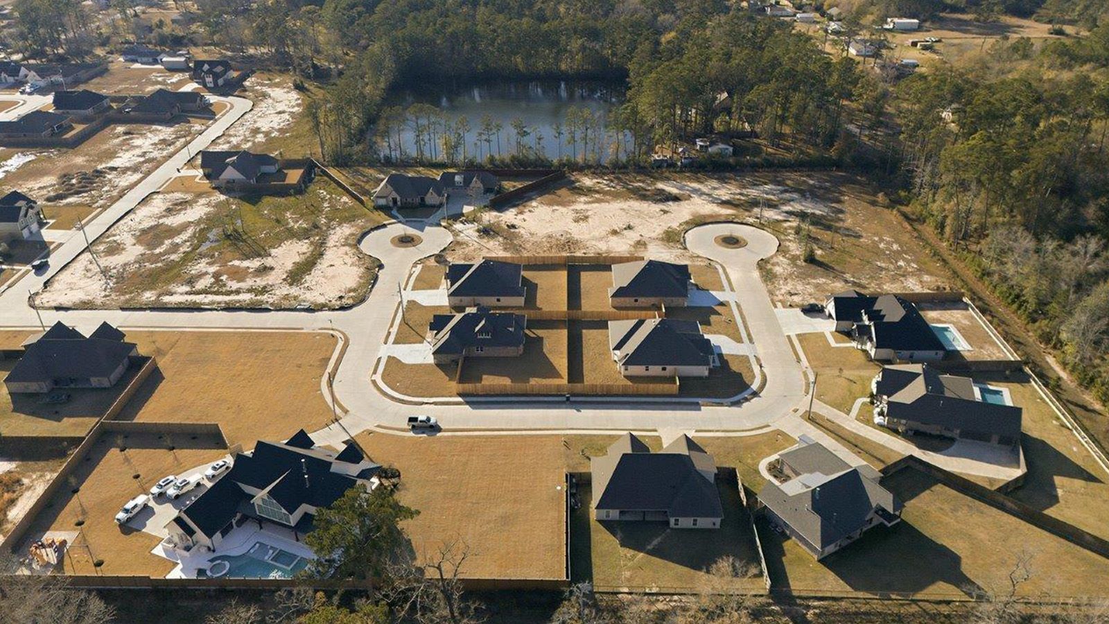 The woods model home ariel view of community.
