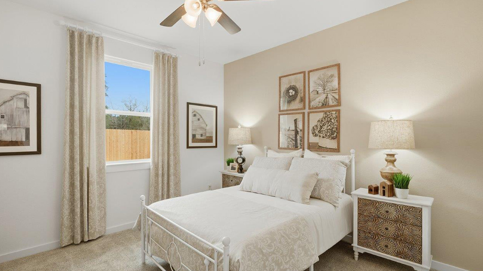 The woods model home secondary bedroom with carpeted flooring and window for natural lighting.