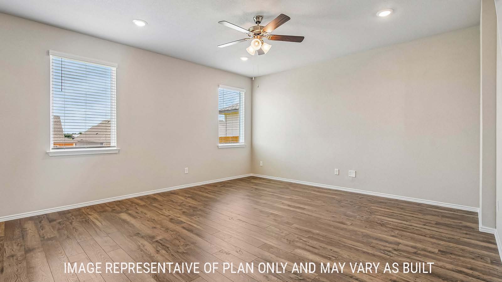 Prosper living room with view of open concept dining room and windows for natural lighting.