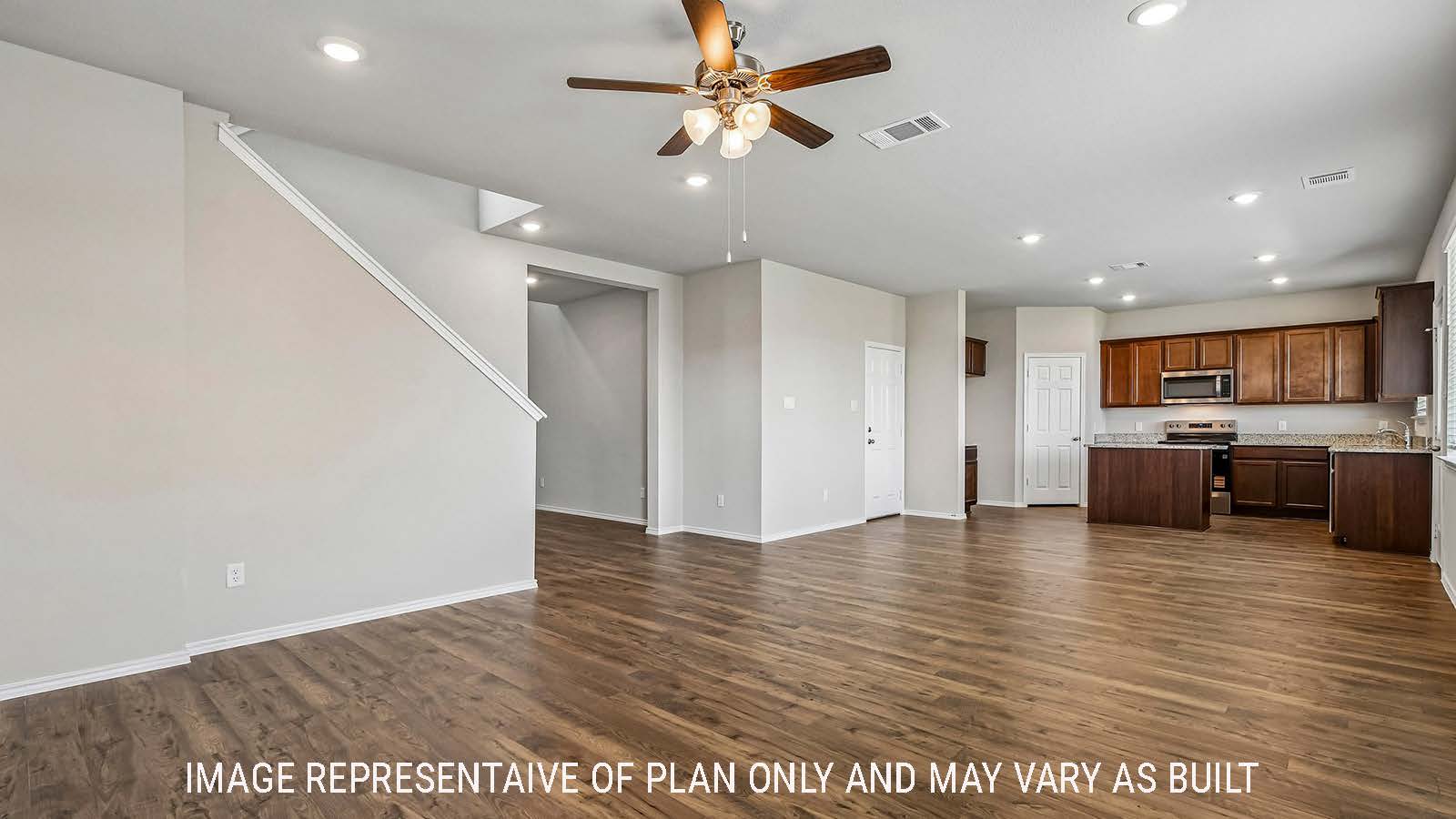 Prosper dining room with view of open concept kitchen and view of hallway.