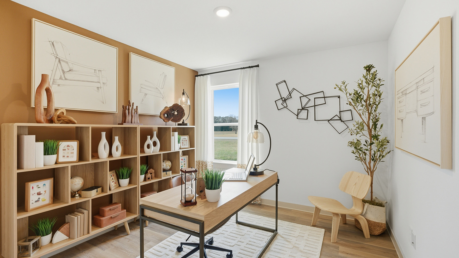 Highland Village model home office with vinyl plank flooring and window for natural lighting.