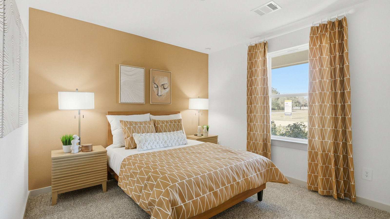 Highland Village model home secondary bedroom with carpeted flooring and window for natural lighting.