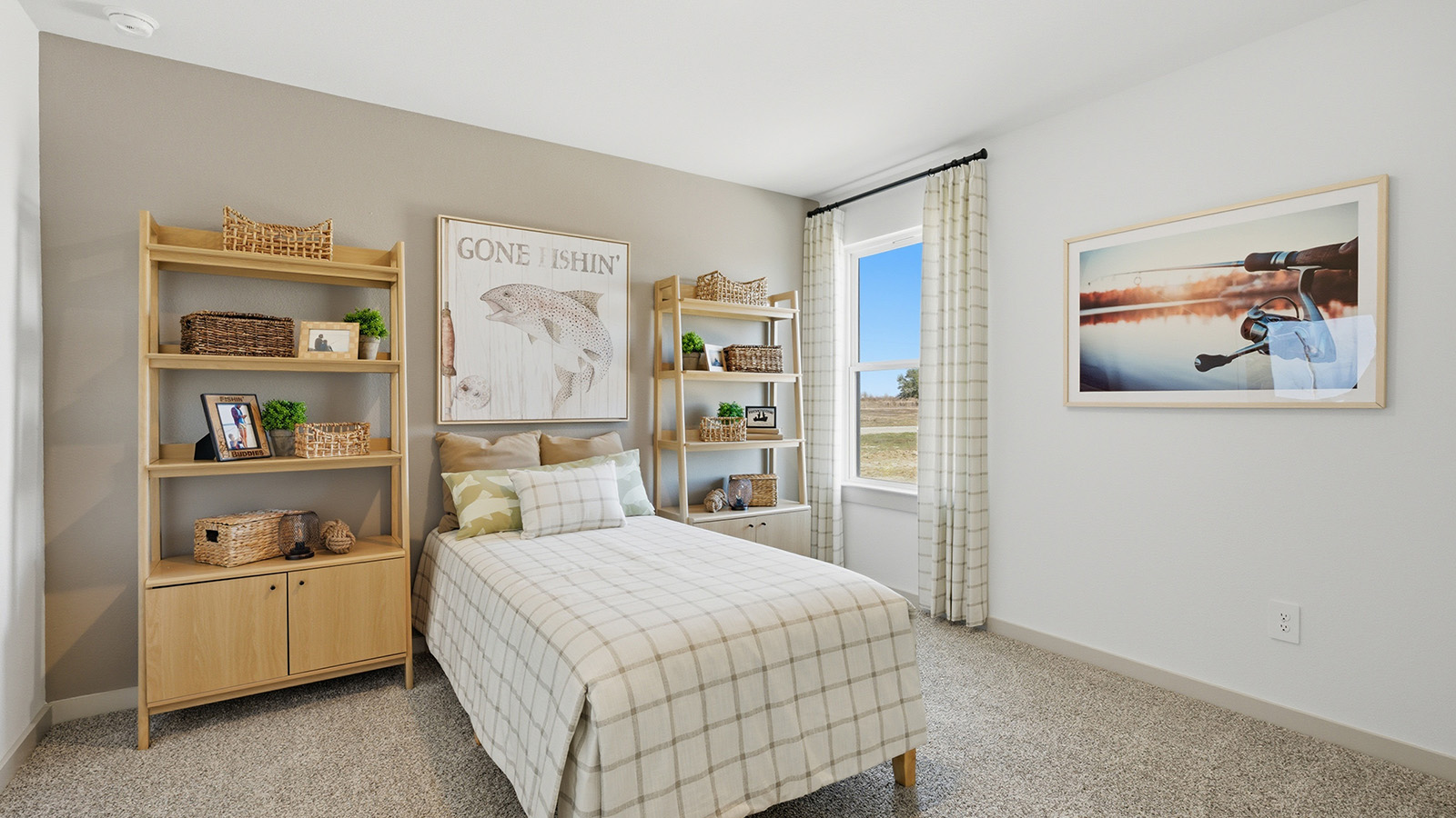 Highland Village model home secondary bedroom with carpeted flooring and window for natural lighting.