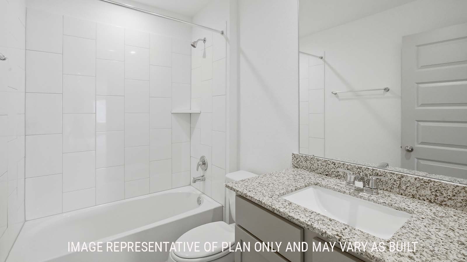Lakeway secondary bathroom with vanity sink and shower and tub combo.