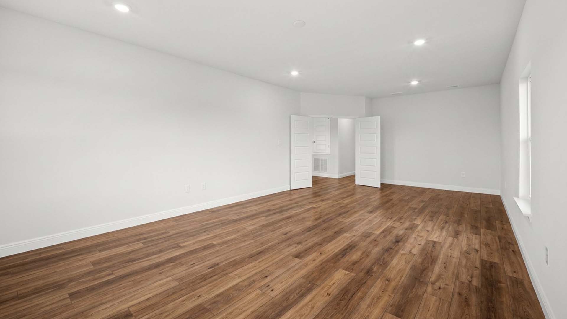 There is a spacious game room on the second level that could be used as a media room