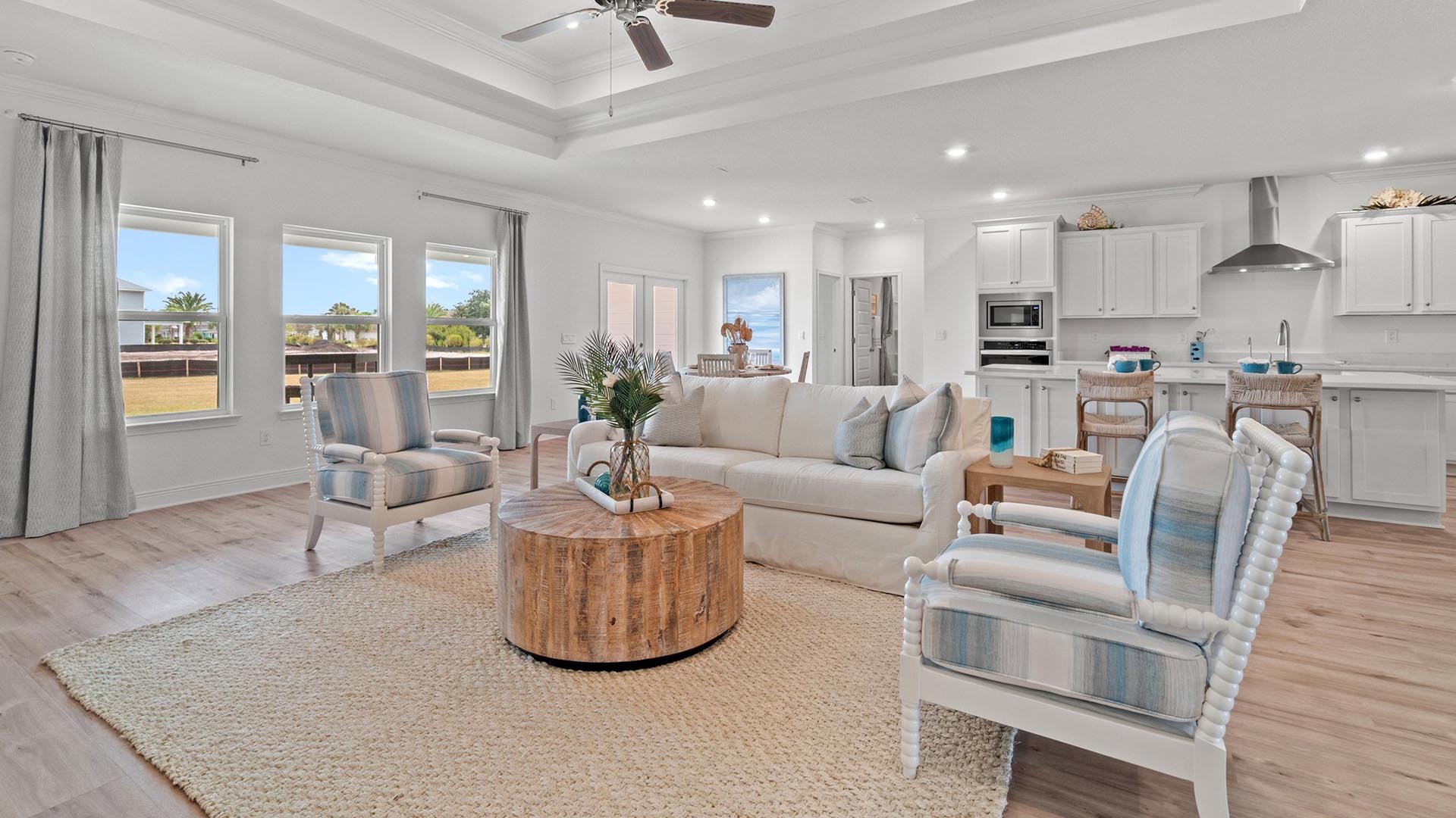 A covered back patio is accessible from the family room