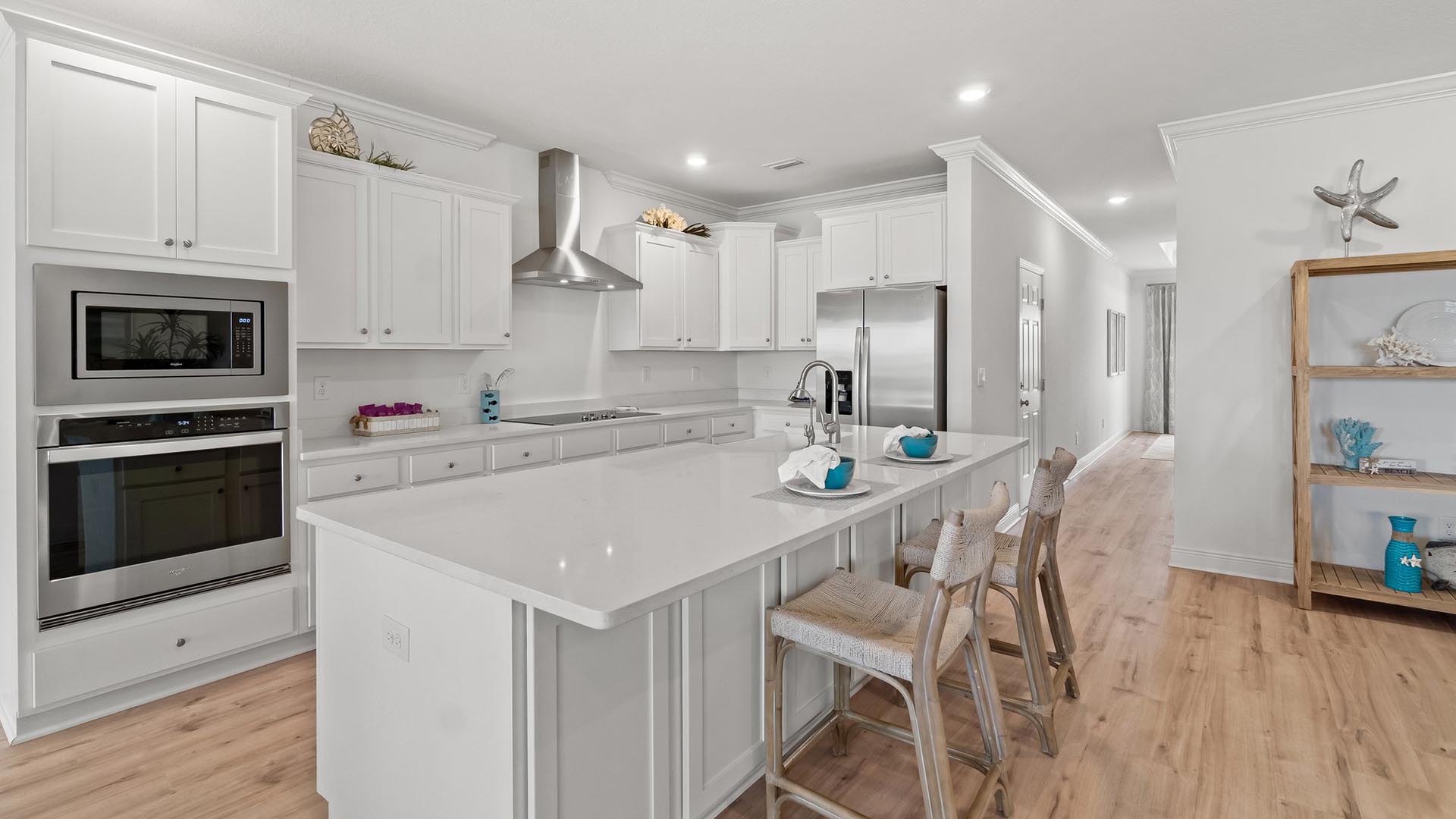 The primary bedroom is spacious and has plenty of natural light