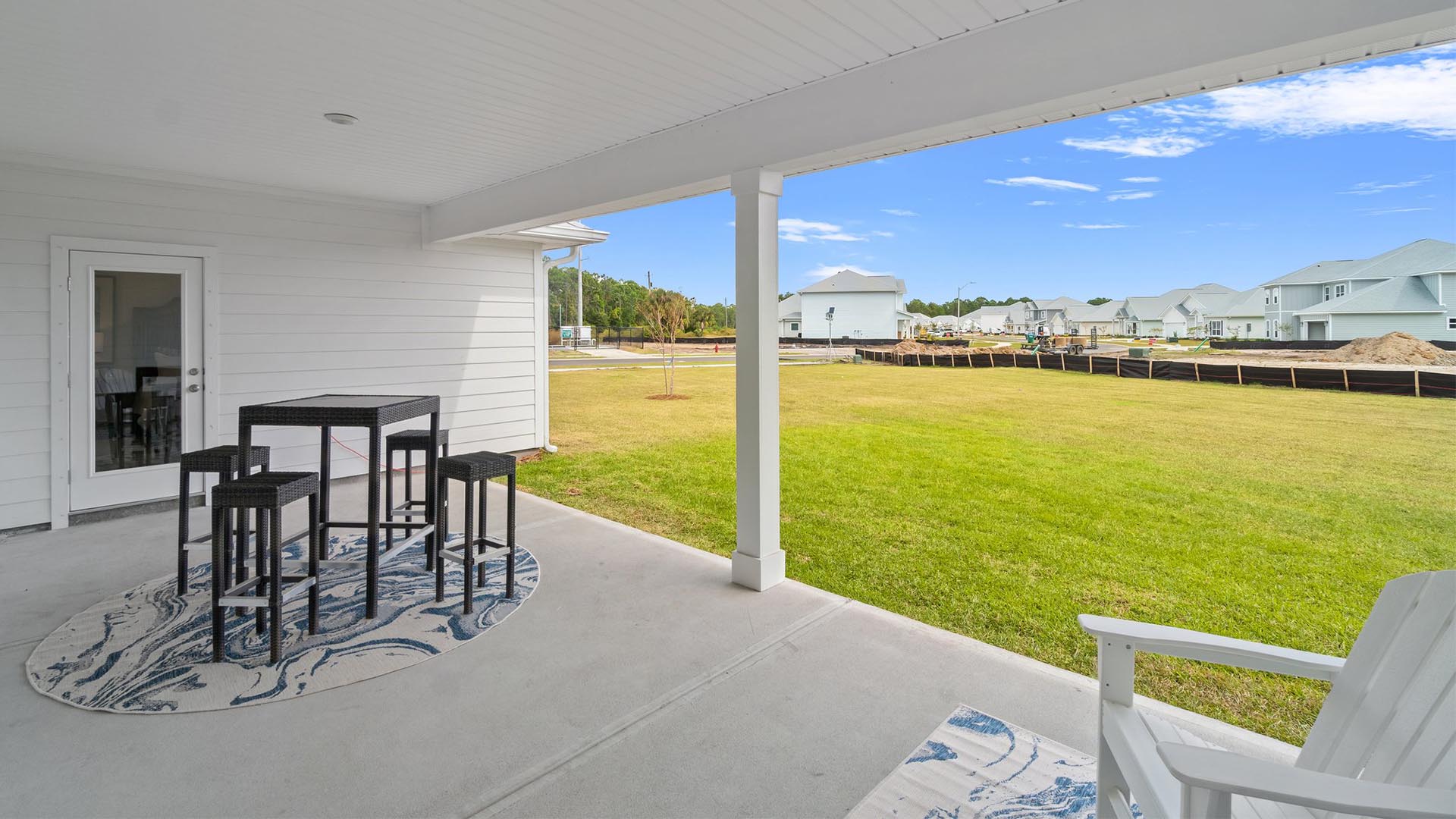 The covered patio of the McKenzie offers the perfect spot for outdoor dining or sitting area