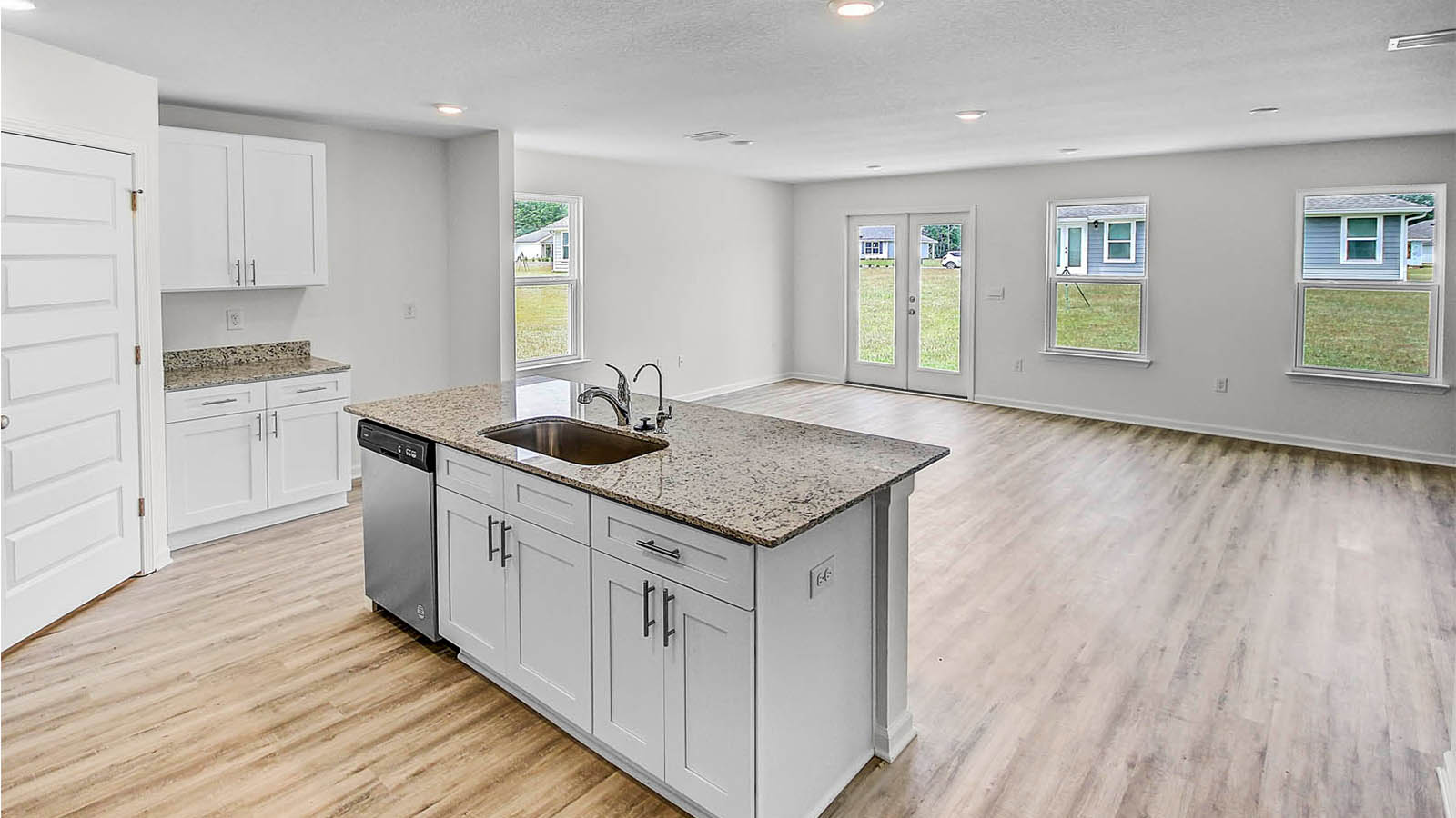 Open Kitchen with EVP flooring and center island