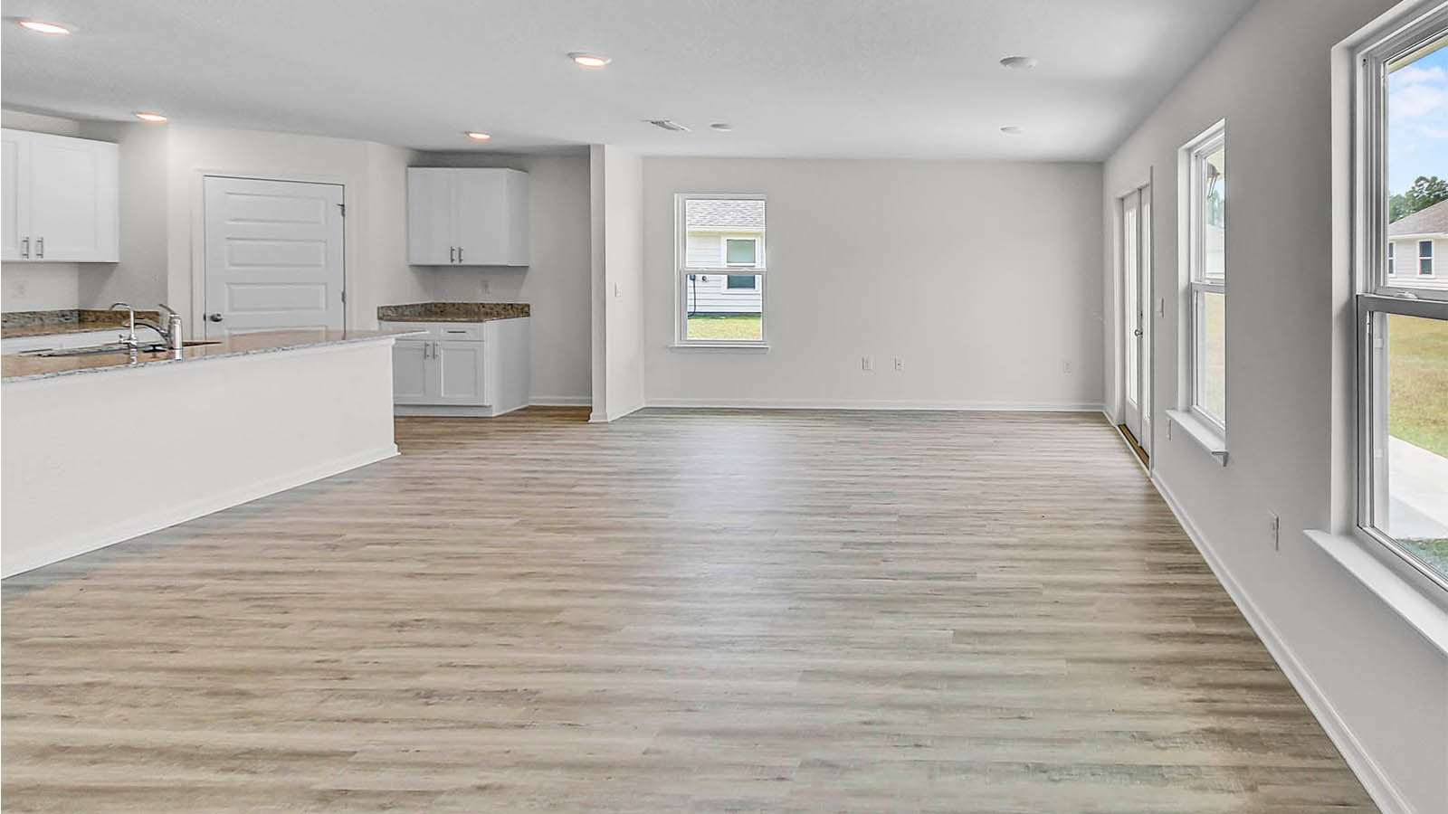 Open concept floor plan allows for a functional living and dining area