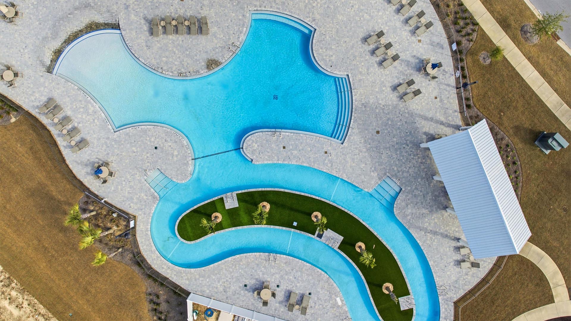 Aerial view of the community pool showing the lagoon style