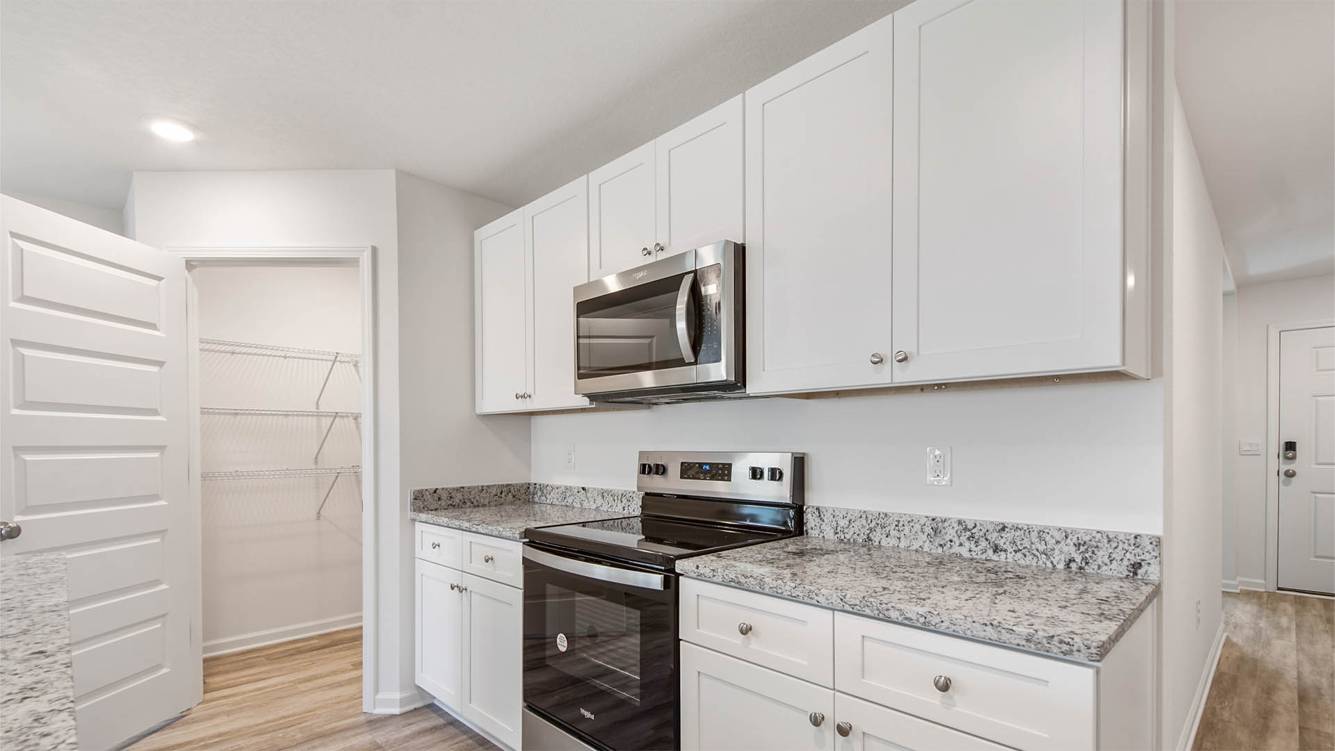 Kitchen features a large pantry for all of your needs