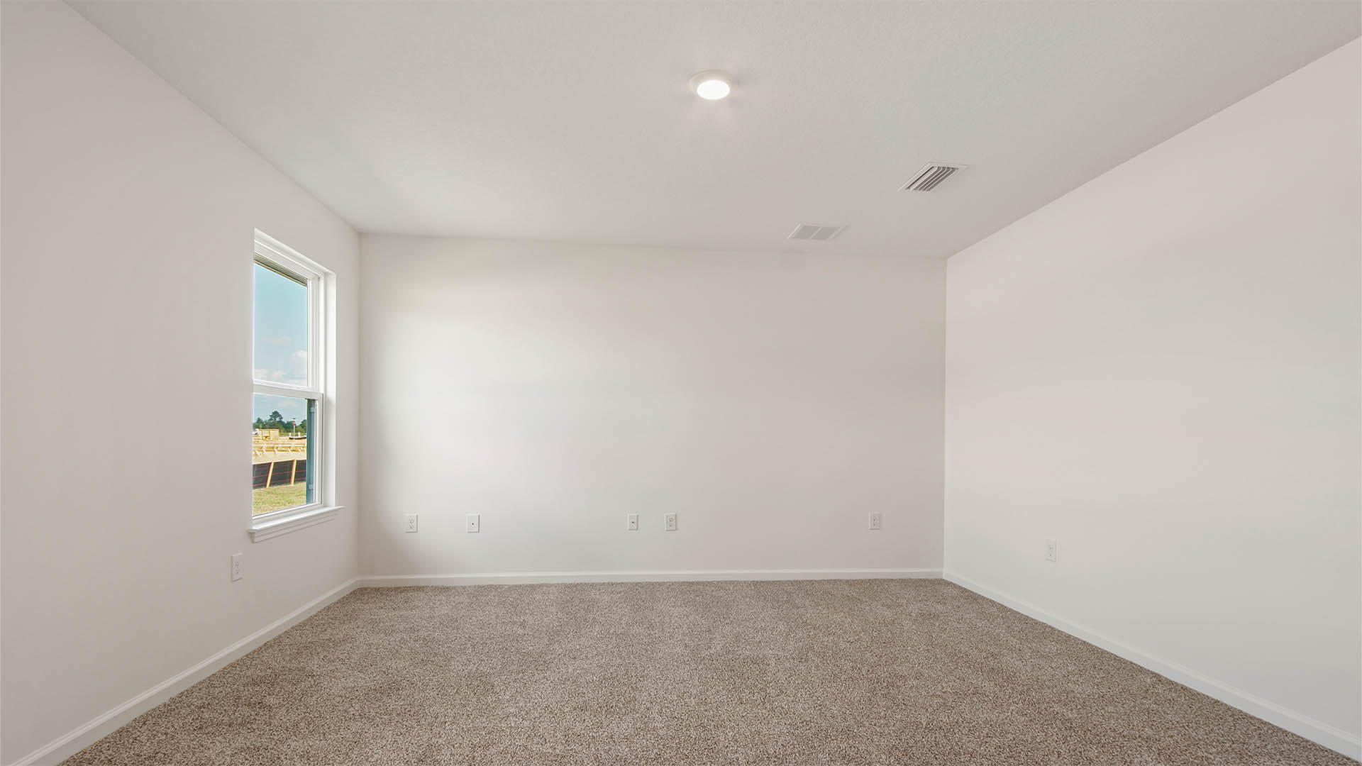 The bedrooms located off the front hallway have a shared bathroom between