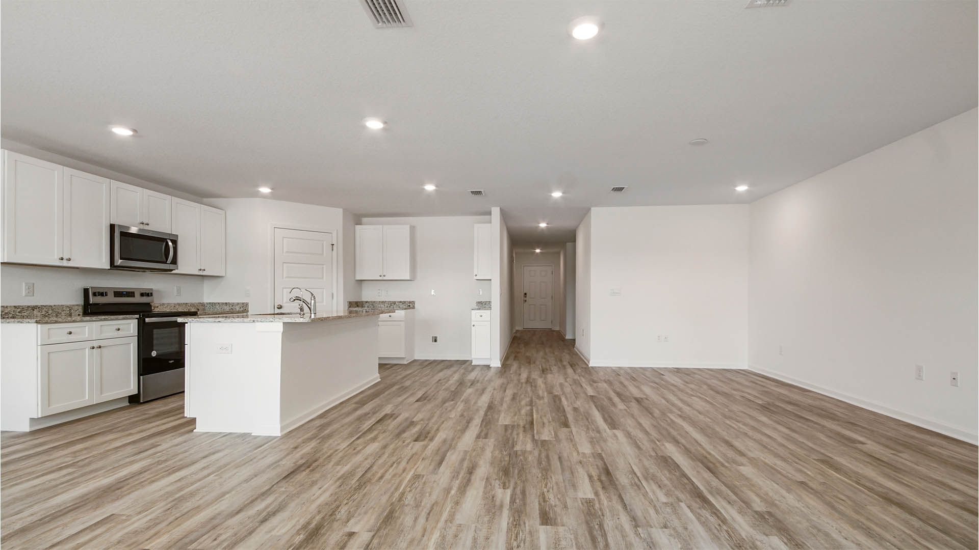 Open kitchen to the dining and living area allow for family and guest time