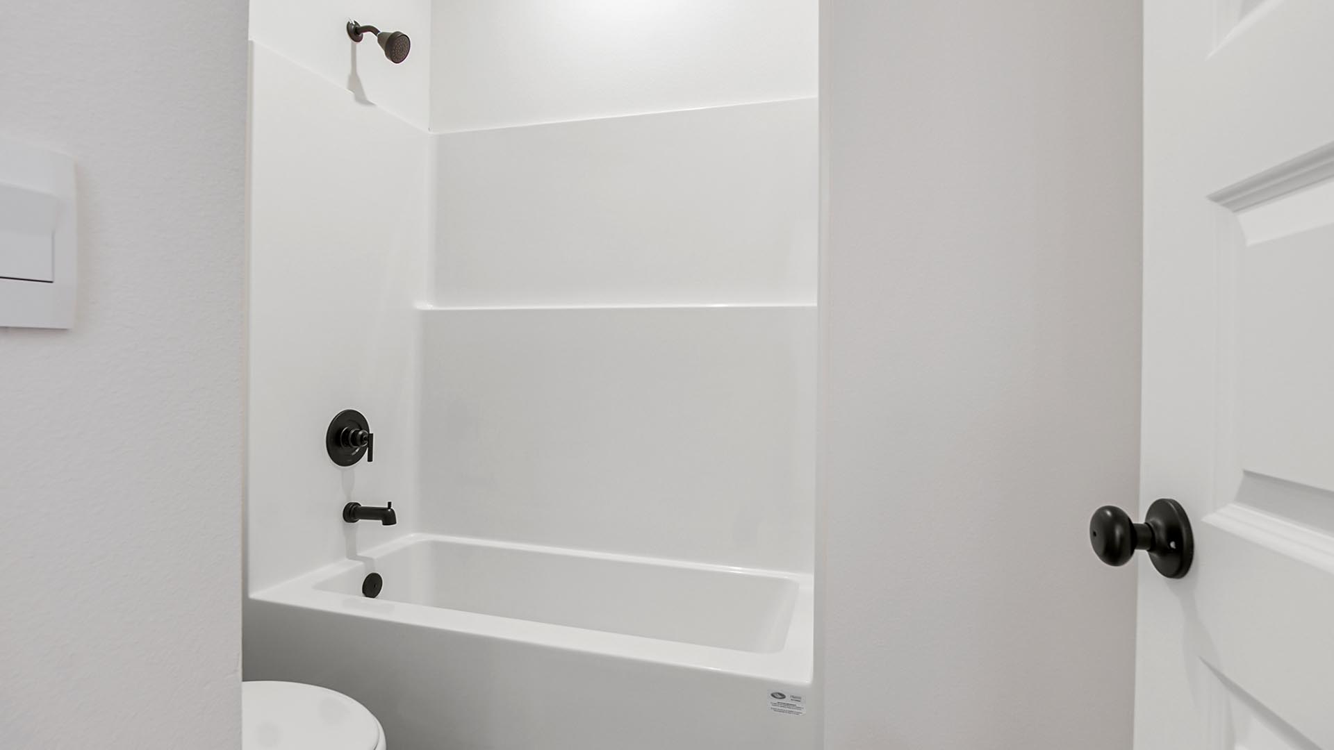 There is a separate water closet for privacy that also holds a shower tub combination