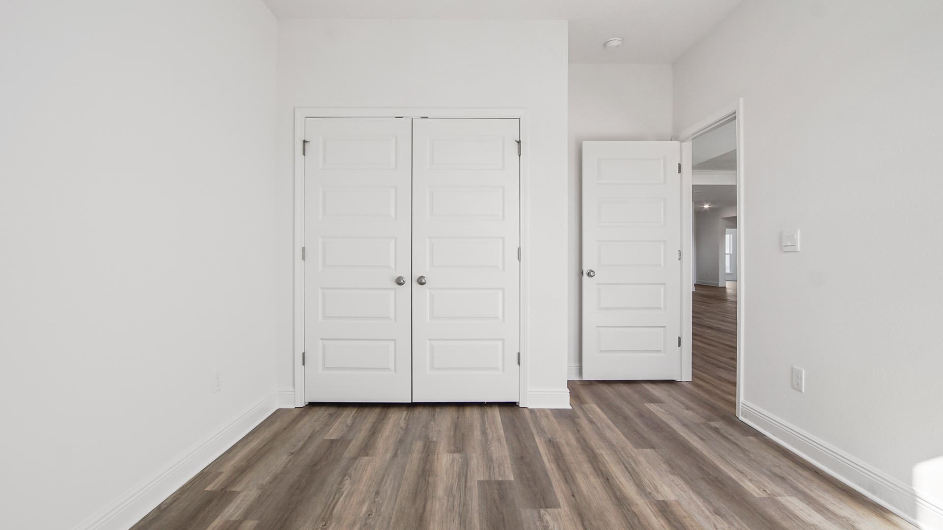 Bedroom three features a spacious closet