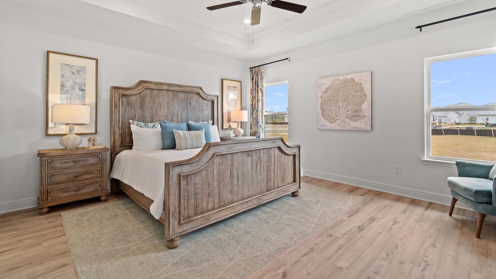 The primary bedroom is spacious and has plenty of natural light