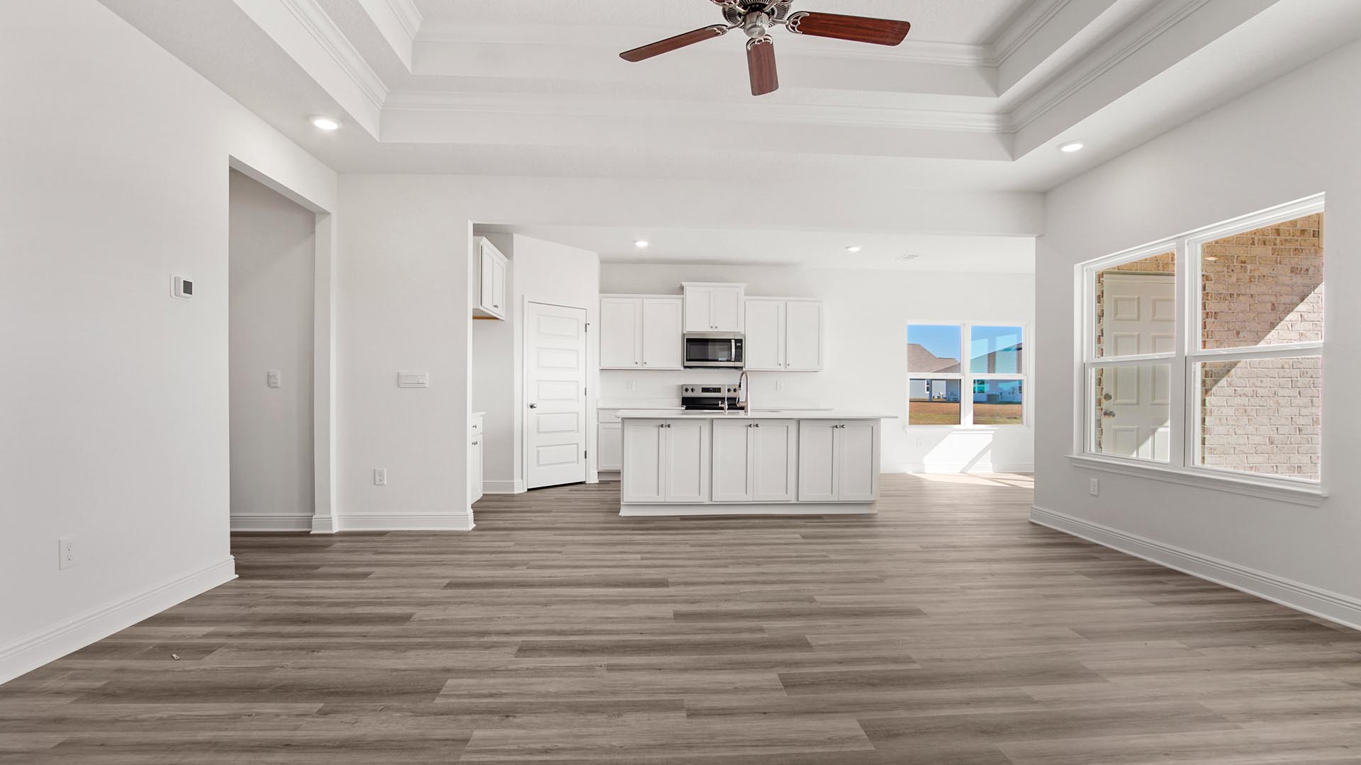 The Madison living area has a ceiling fan