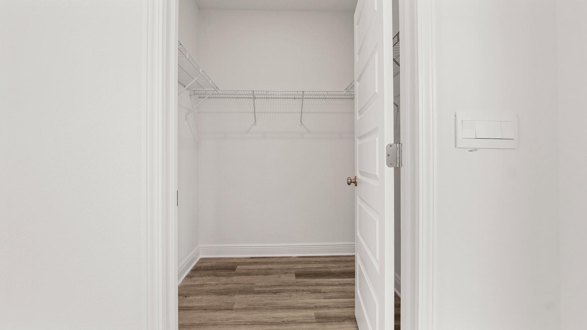 There is a spacious closet in the primary bathroom