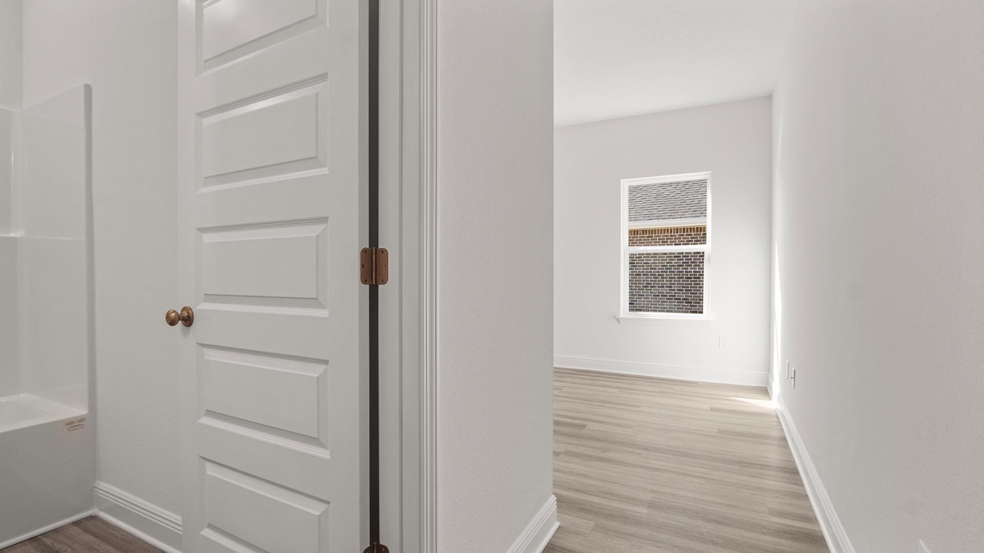 Bedroom four has a EVP flooring