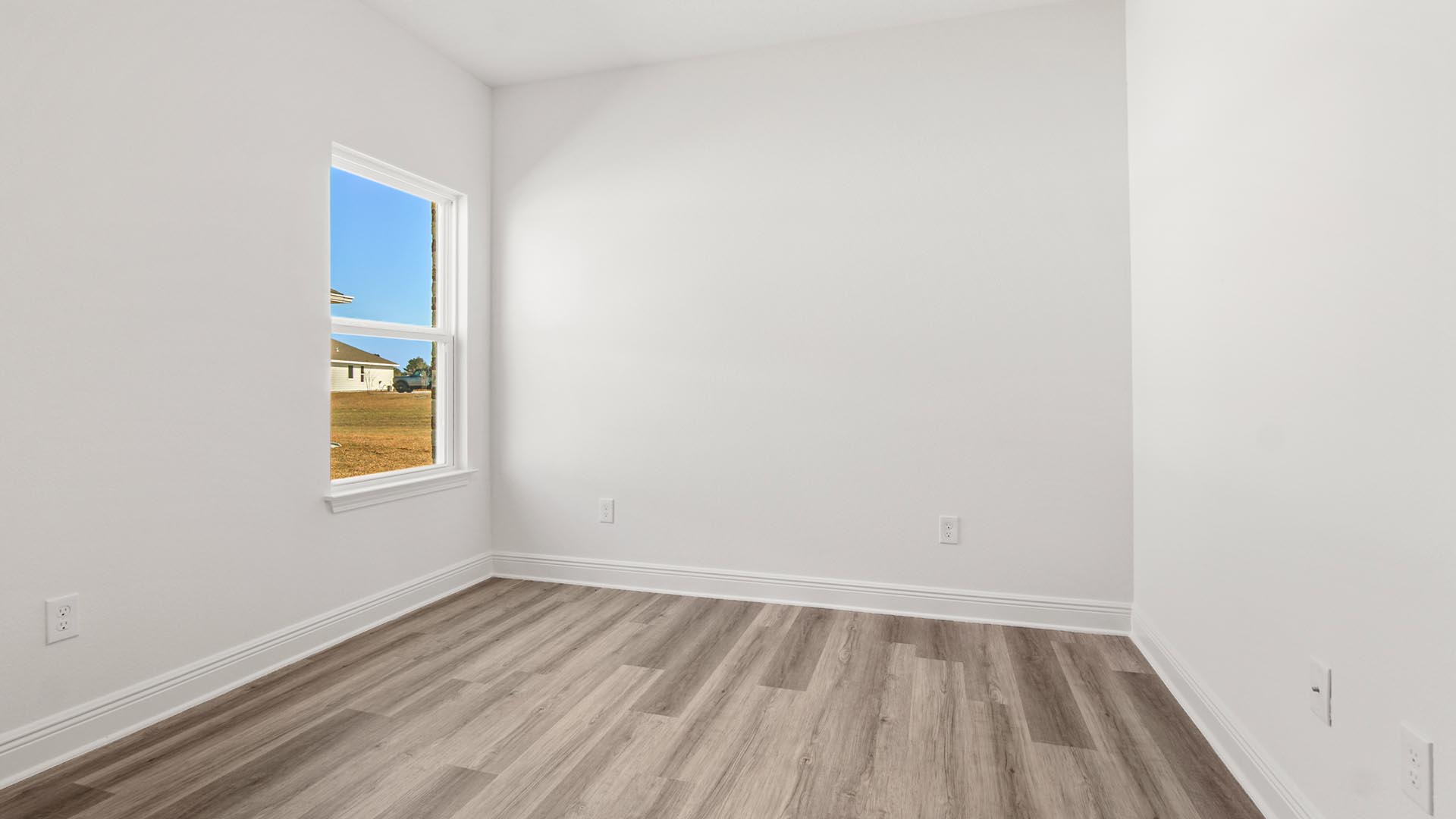 Bedroom three has EVP flooring