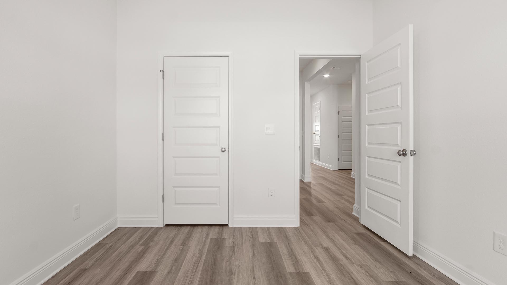 Bedroom two has EVP flooring and ample closet space