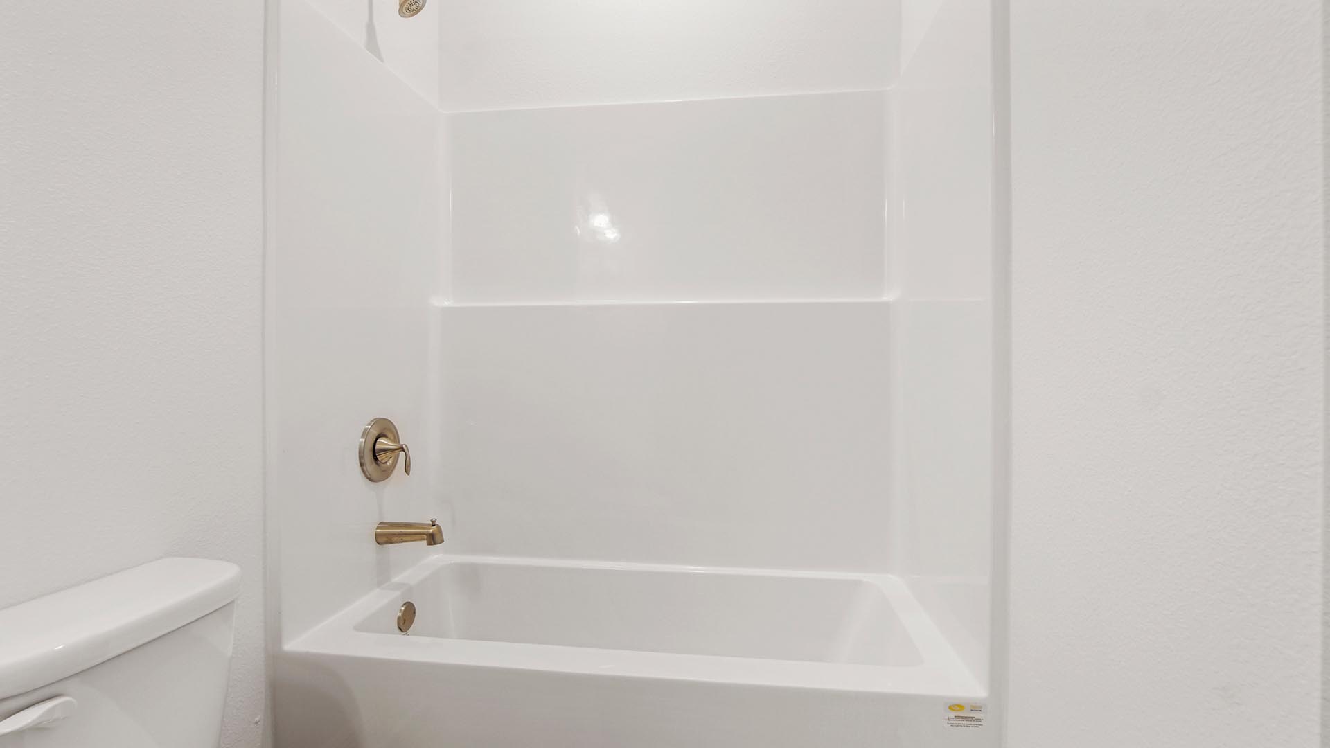 Bedroom four bath has a shower and tub combination